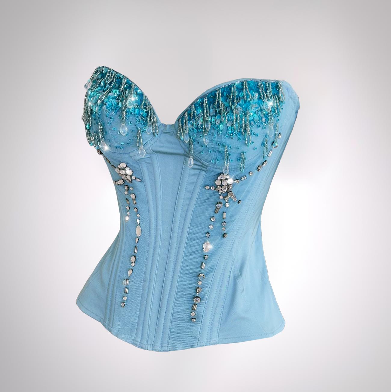 Spektakuläres Mugler Teardrop-Korsett-Top.
Das schöne Stück zeigt die für Thierry Mugler typische Mischung aus kühner Struktur und femininer Eleganz. Das Korsett in zartem Puderblau zeichnet sich durch eine perfekt geschnittene Sanduhr-Silhouette
