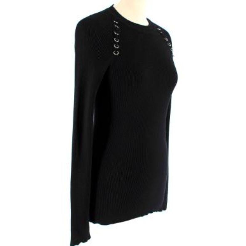 Mugler Eyelet Detail Black Ribbed Knit Top

-Medium weight 
-Long-sleeve black ribbed top
-Silver hoop detailing 

Material
-72% viscose 
-28% polyester

Washing
- Dry clean only 

MADE IN ITALY

Condition 9.5/10 Excellent condition

PLEASE NOTE,
