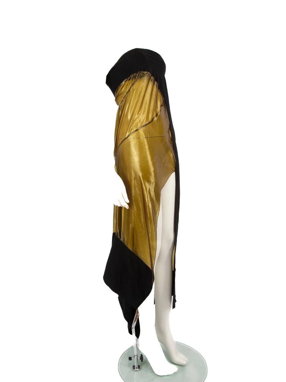 CONDITION is Very good. Minimal wear to the dress is evident. The hanging loop on the left side of the neckline has been cut out. Plucks to the weave and small holes on the left side and towards the lower half around the hem and there is a pull to