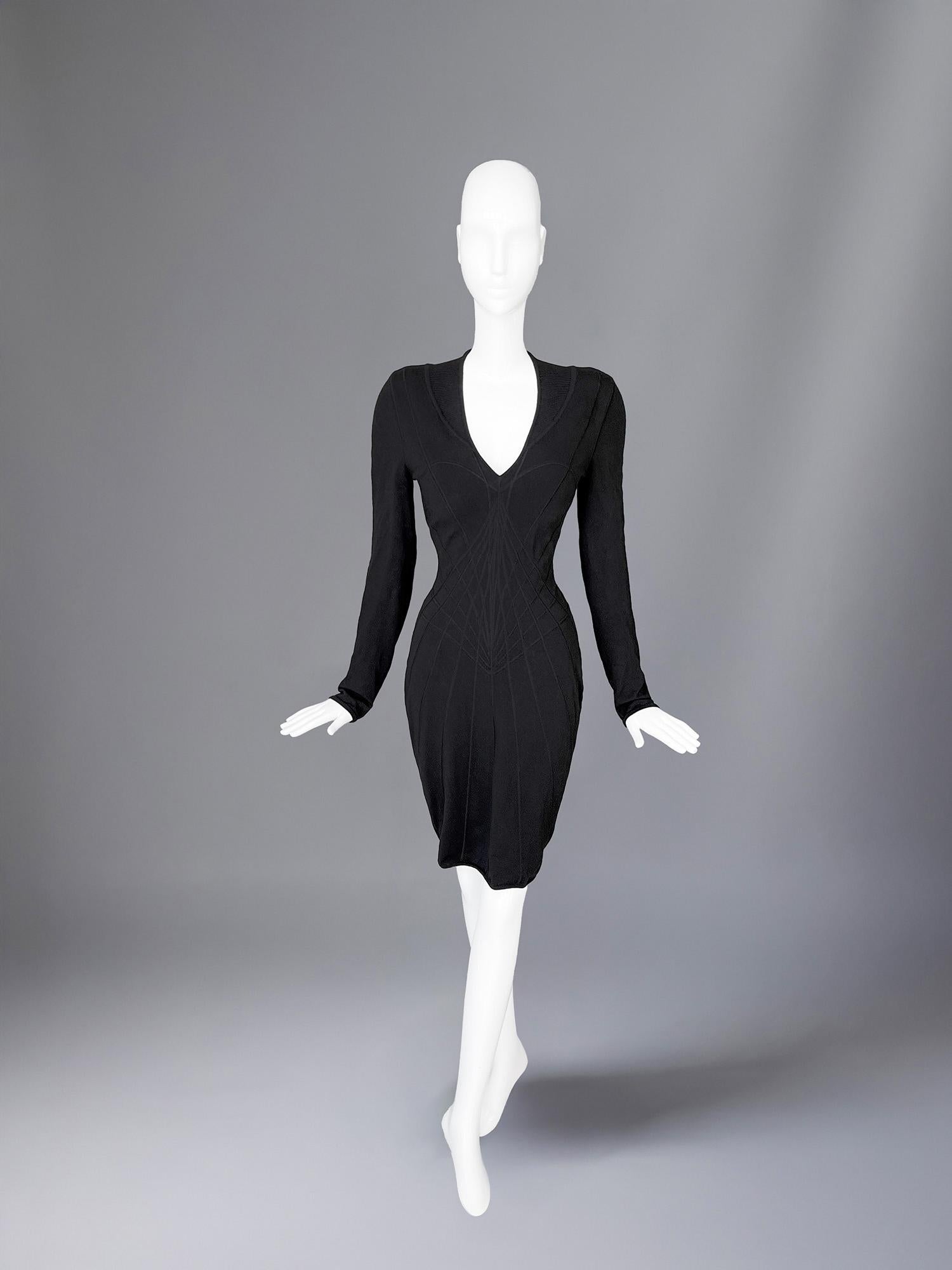 The gorgeous black rtw version of the sensational Thierry Mugler Spider Dress or TRON Dress, shown on the Runway pics. Birth of this Design was the  FW 90/91  