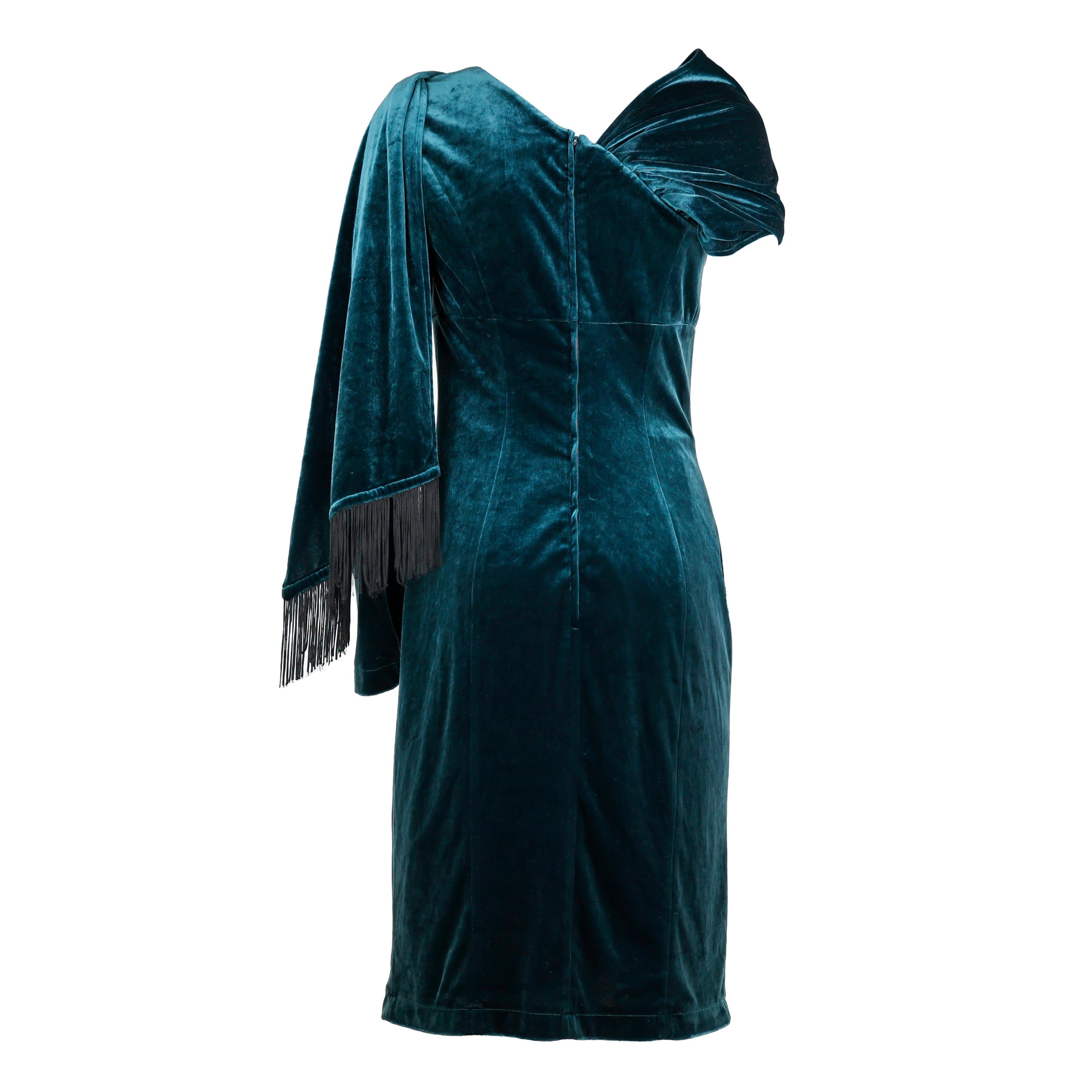 Vestido Mugler de terciopelo color turquesa, talla S.

Estado:
Muy bueno.

Embalaje/accesorios:
Percha.