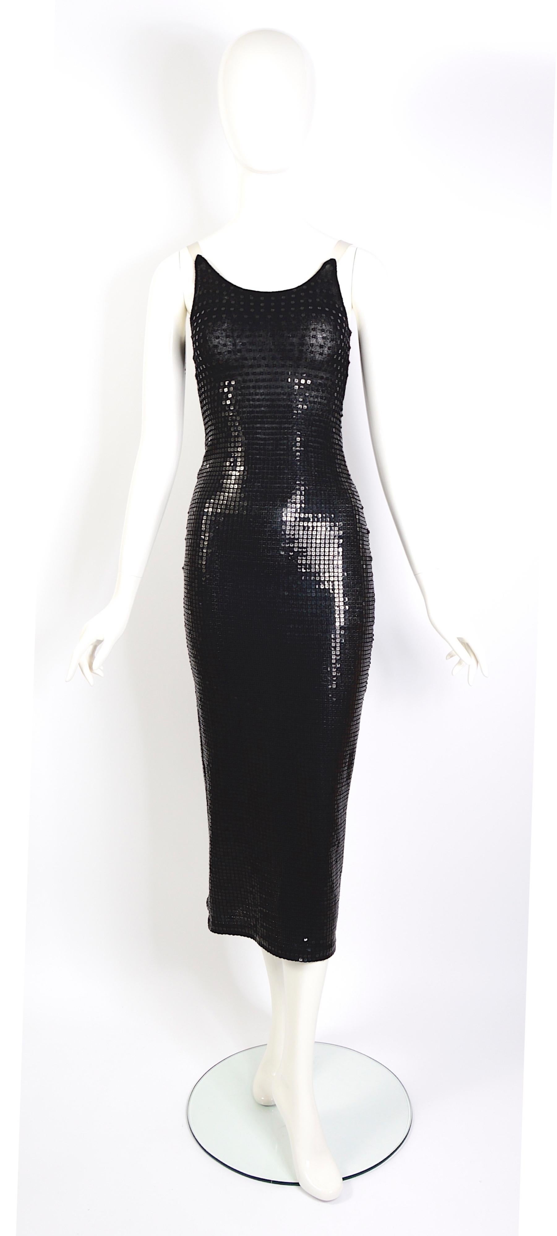 Thierry Mugler vintage 1990s black fine knit embellished sequined slip party dress.
Size is in between a French 34 or 36. it depends on how tight you want to wear the dress. Our doll is a french 36
Measurements that are taken flat without stretching