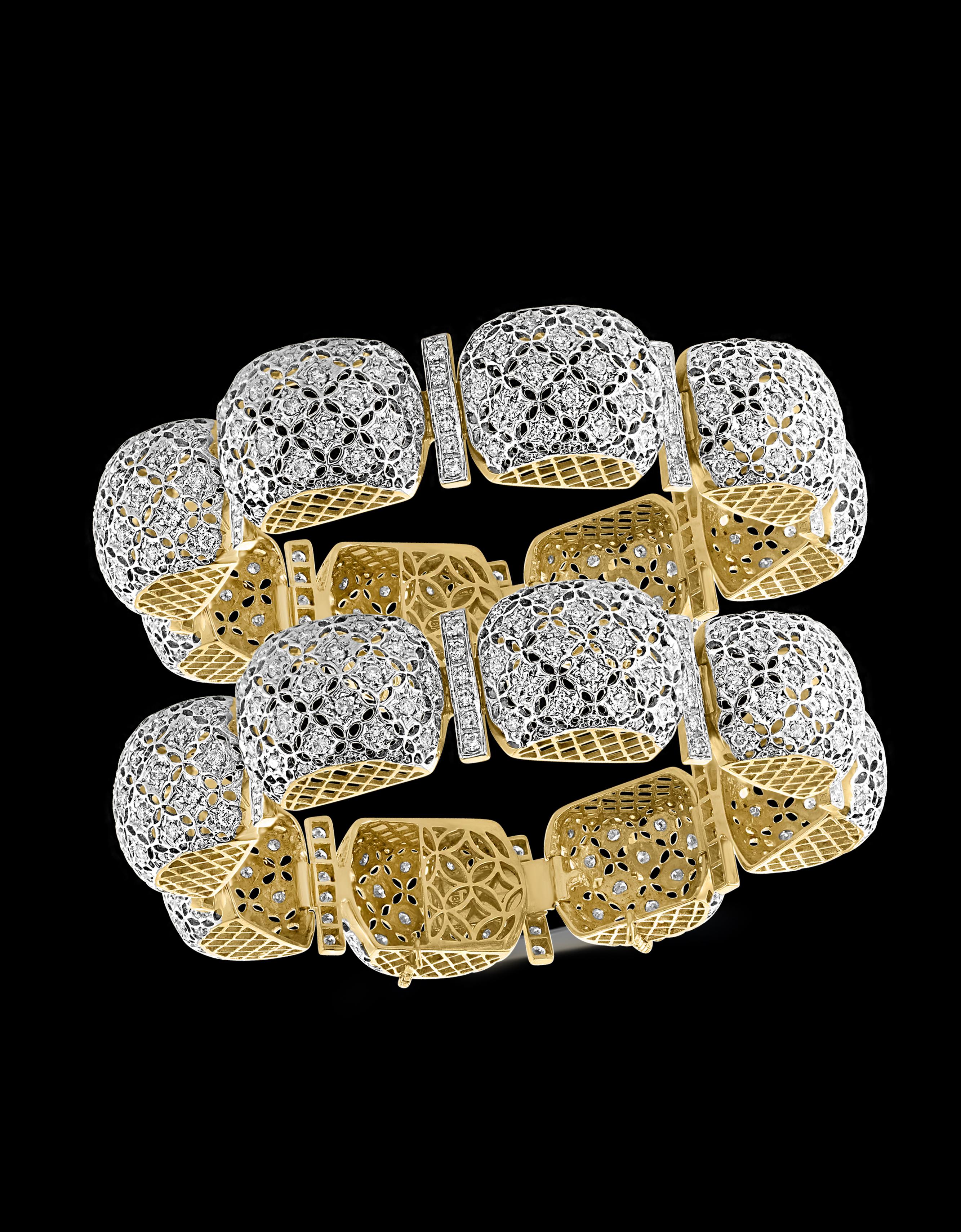 Mogul Style pair of Bangles  in 18 K gold featuring intricate workmanship 
It comes in a pair .
This  iconic and timeless bracelet from Mogul collection is finely crafted in 18 K Yellow gold and set with 9 carats of  brilliant-cut round diamonds.