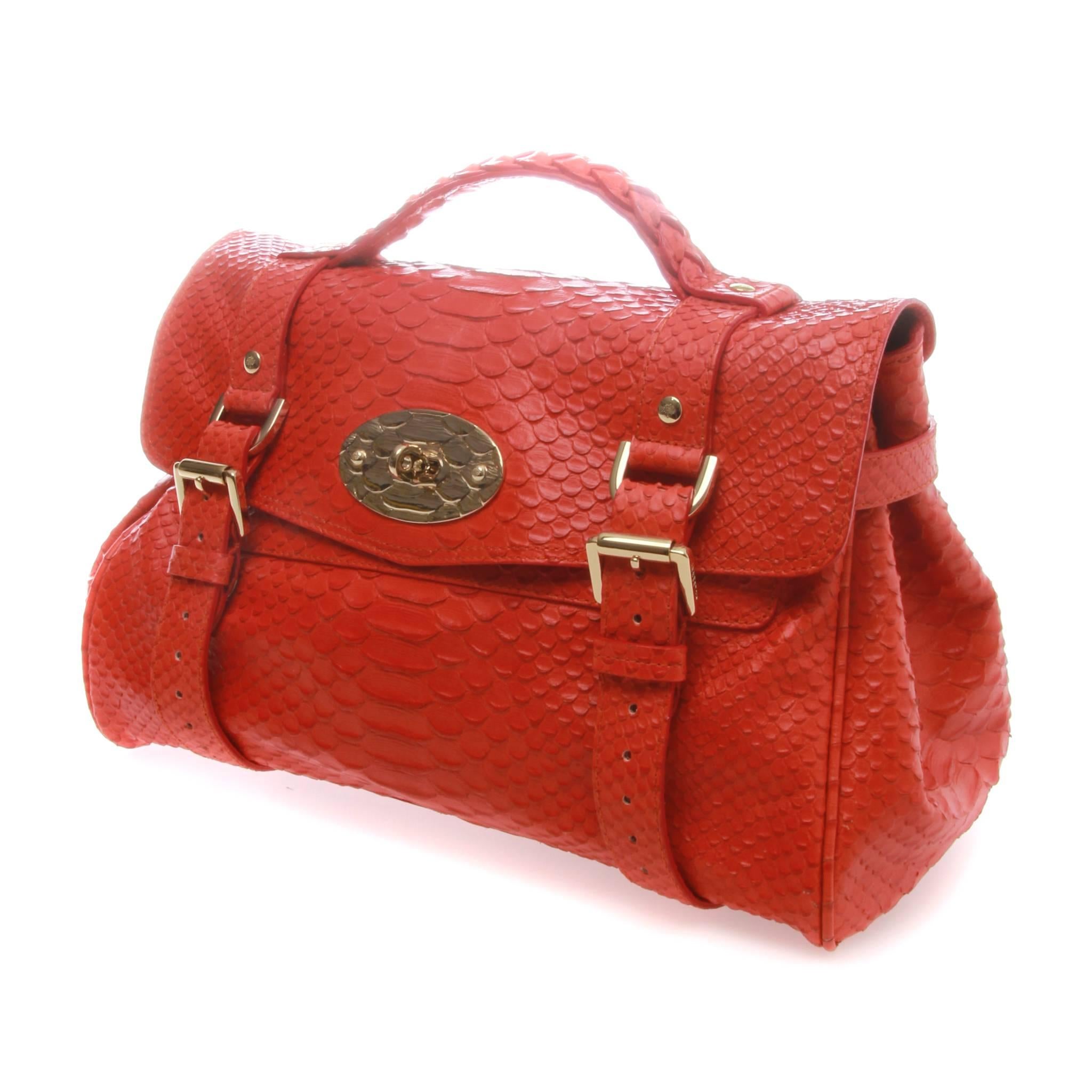 FINAL SALE

Mulberry Alexa satchel in a silky textured snakeskin look leather. 

The bag features a leather top handle with an adjustable shoulder strap a cross over flap with belts, and buckles, links and a turn lock in a lovely faux snake brass.
