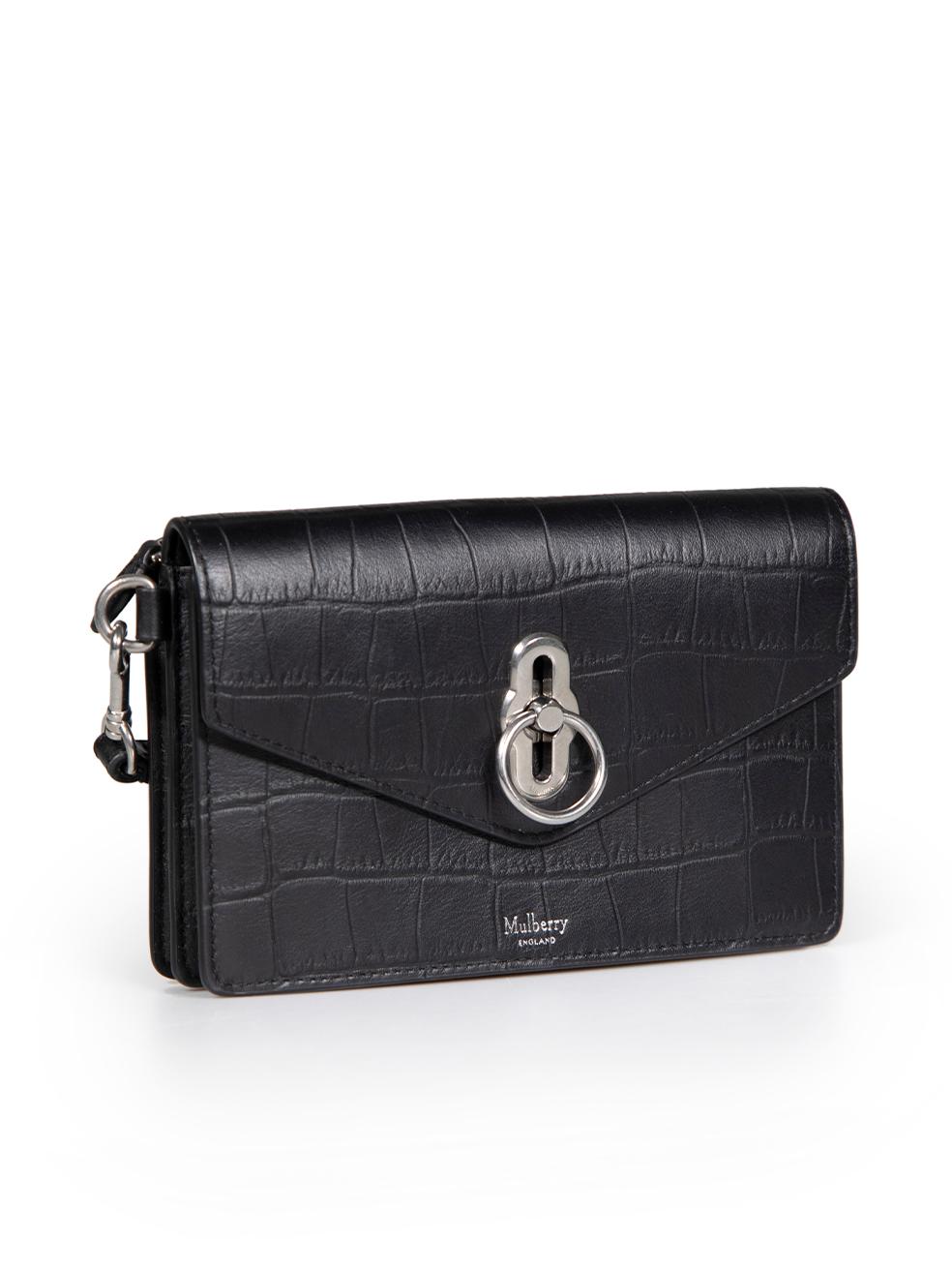 CONDITION is Very good. Minimal wear to bag is evident. Minimal wear to the front fastening hardware with light scratches to the metal on this used Mulberry designer resale item.
 
 
 
 Details
 
 
 Amberley model
 
 Black
 
 Leather
 
 Mini clutch