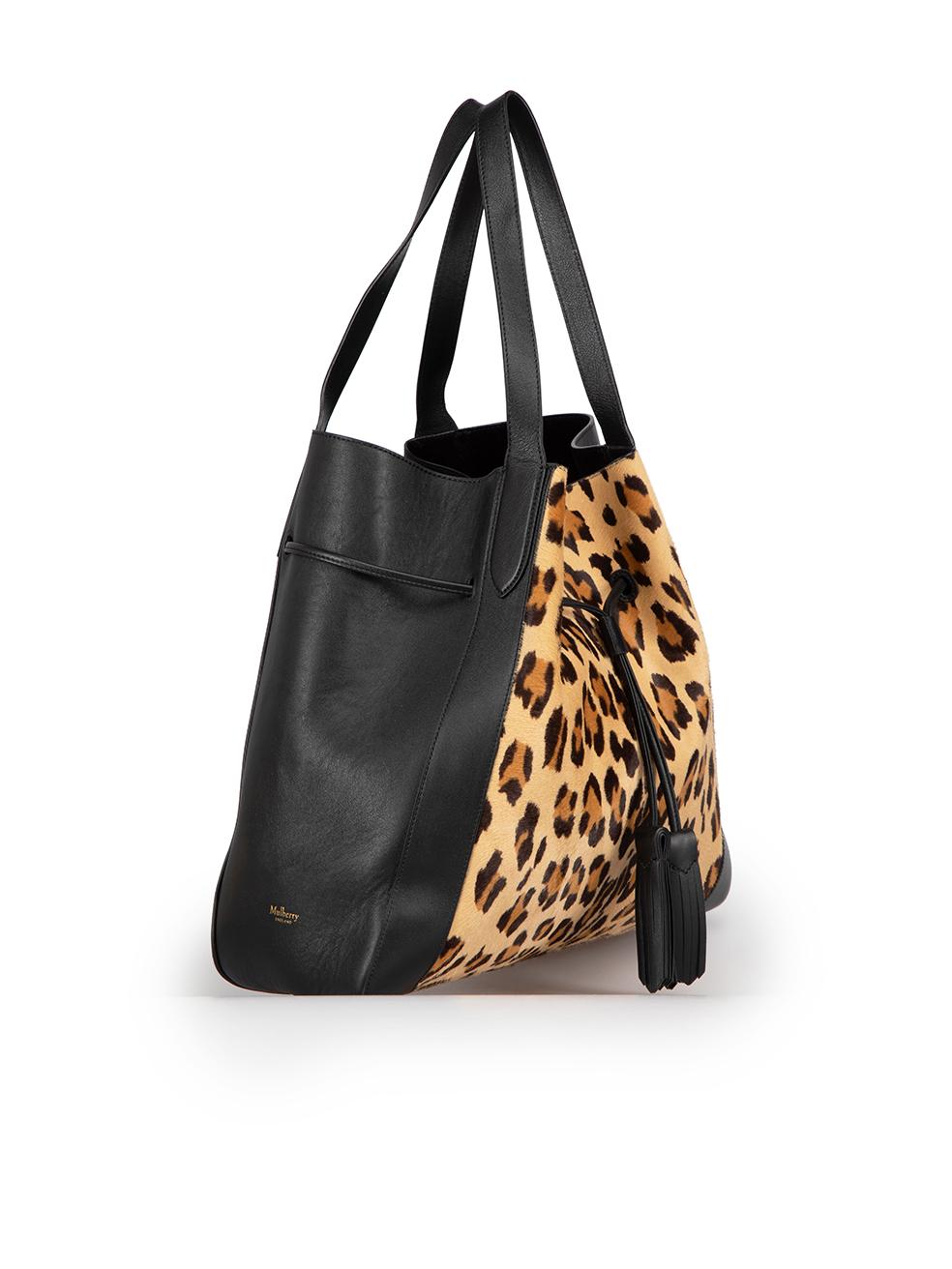 CONDITION is Very good. Minimal wear to bag is evident. Minimal wear to the rear with very light abrasion to the leather on this used Mulberry designer resale item.
 
Details
Millie
Black
Calf leather
Large tote bag
Brown ponyhair leopard print