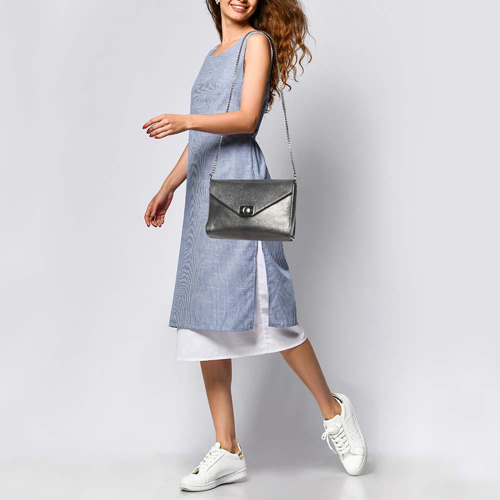 Designer bags are ideal companions for ample occasions Here we have a fashion meets functionality piece crafted with precision. It has been equipped with a well sized interior that can easily fit your small essentials.