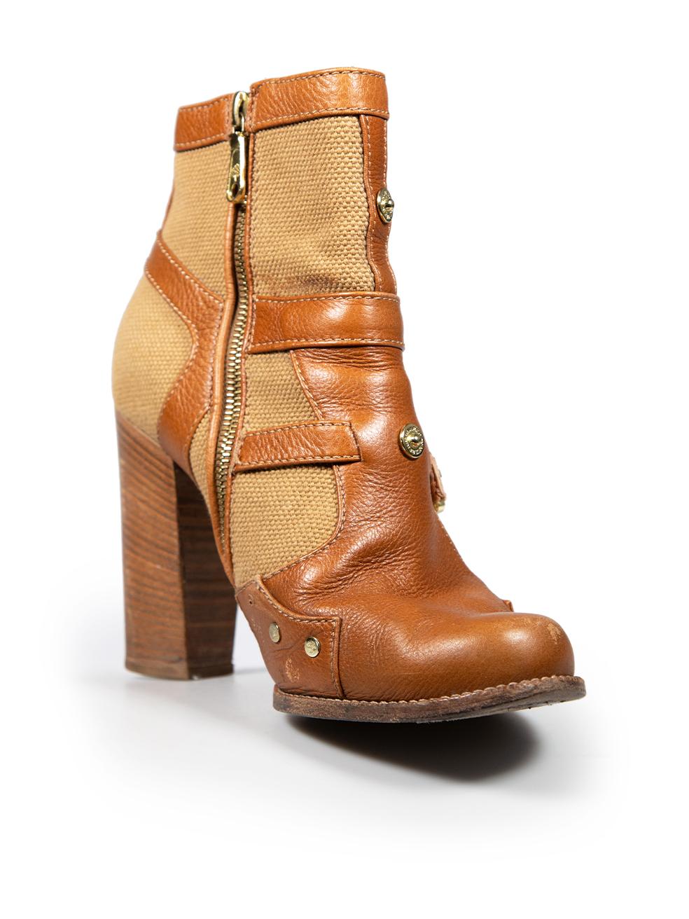 CONDITION is Good. General wear to the boots is evident. Abrasion to the rim of the left shoe, the left side of the left shoe, the left side of the right shoe, the toe box and counter of both shoes. General creasing to the leather on the buckles of