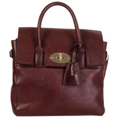 MULBERRY + CARA DELEVIGNE Sac à dos MINI en cuir bordeaux