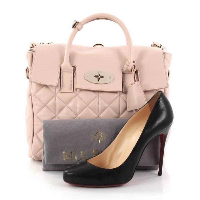 This authentic Mulberry Cara Delevingne Convertible Backpack Quilted Leather Medium is influenced by supermodel Cara Delevingne's cool practicality. Crafted in light pink leather, this clever and iconic handbag can be worn three ways: as a backpack,