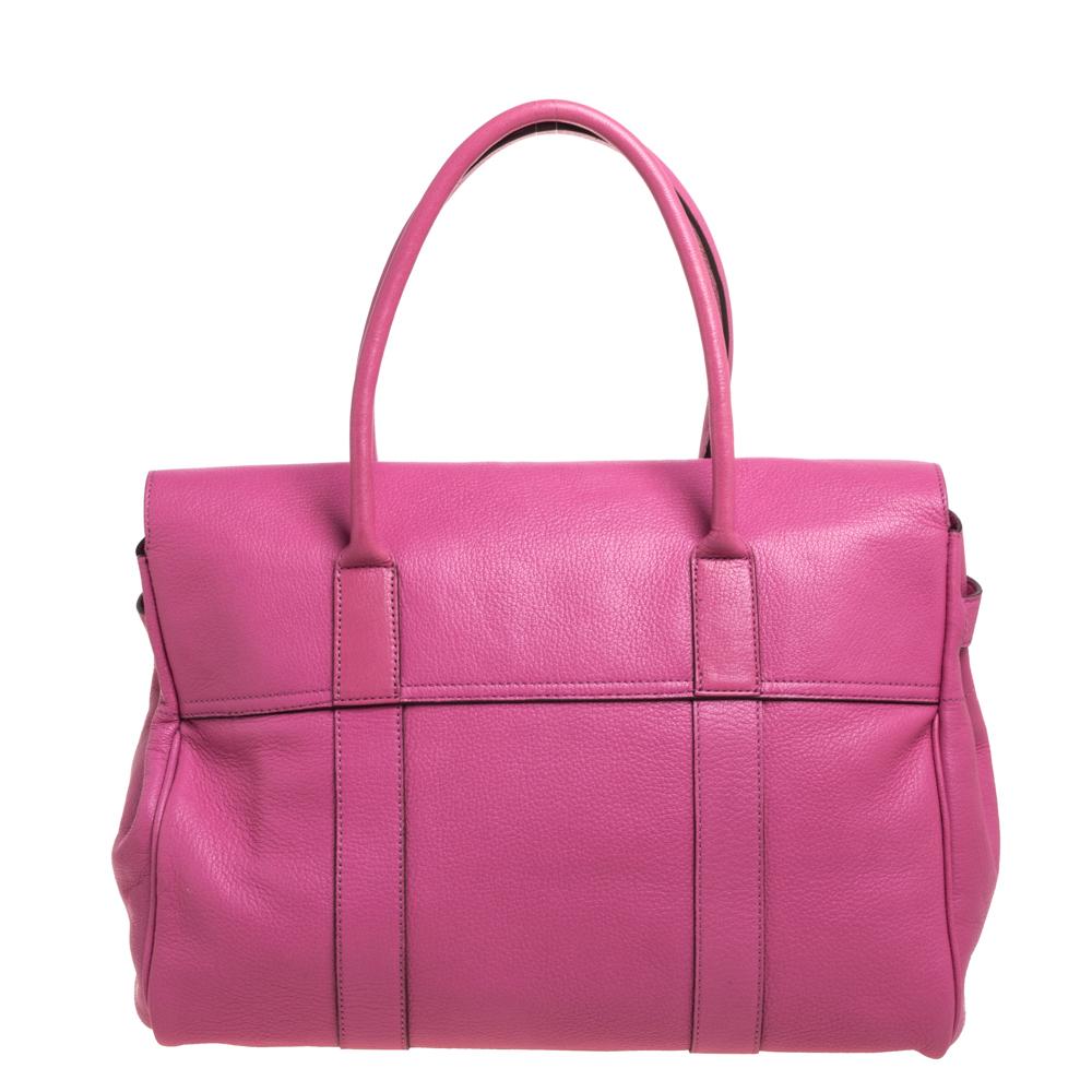 The Bayswater is one of the most well-known collections from Mulberry, so it's fair to say that this satchel is worth the buy. Crafted from pink leather, the bag is equipped with two handles and a turn lock on the flap securing a capacious