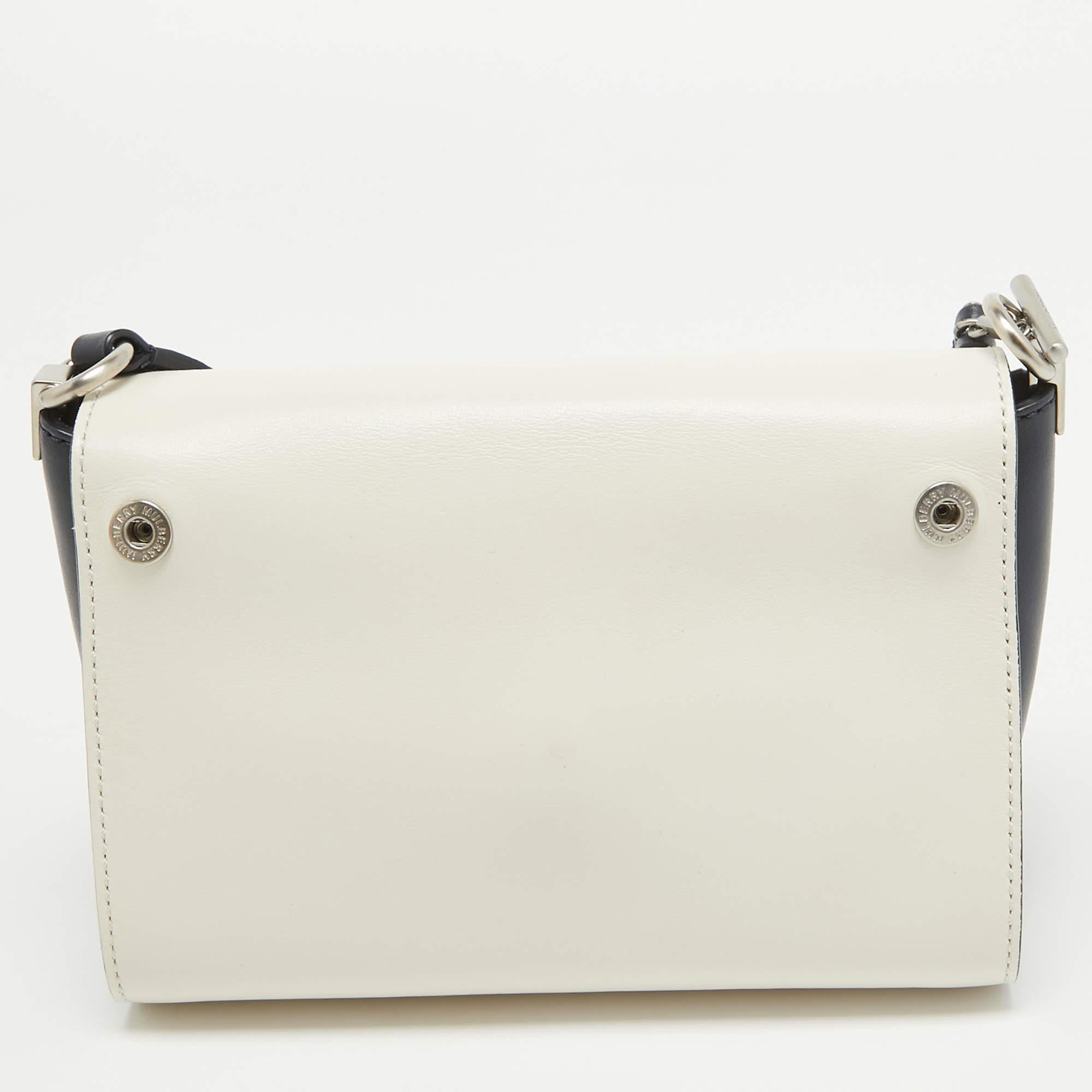 This multicolor leather bag from Mulberry is built to take you through your day with ease. This smartly designed piece has a compact silhouette. The bag features a shoulder strap and a lined interior secured by a metal lock on the flap.

Includes: