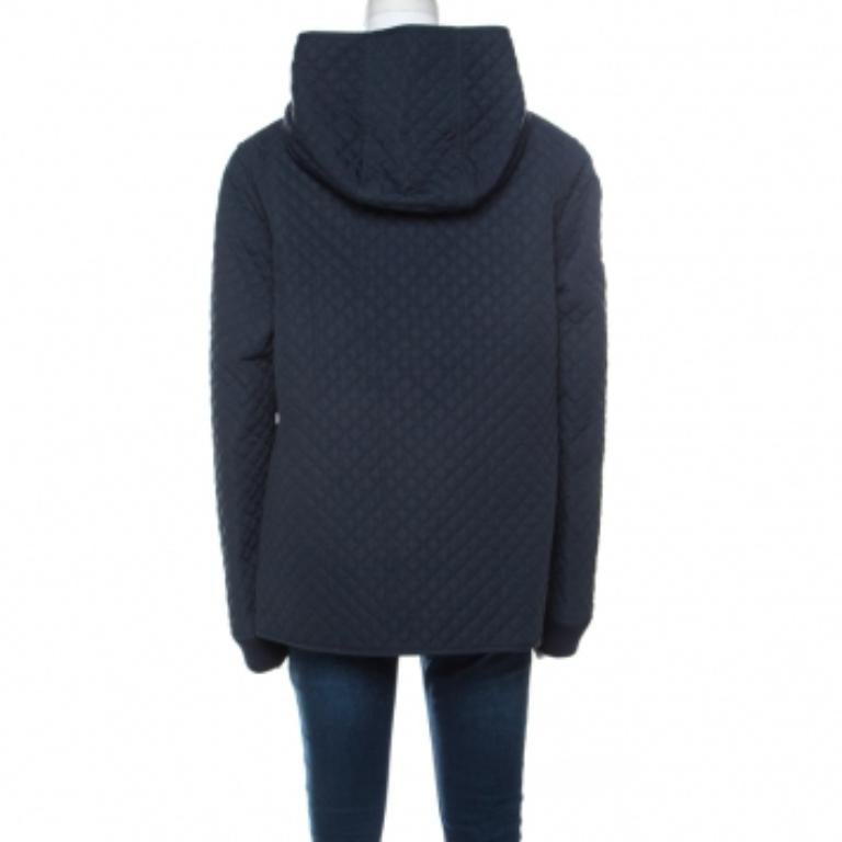 This navy blue jacket from Mulberry is simple and just the right choice for your style. It is made from quality fabrics and designed as a hoodie with a front zipper, pockets and quilting all over.