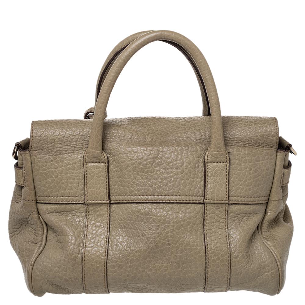 The Bayswater is one of the most well-known collections from Mulberry, so it's fair to say that this satchel is worth the buy. Crafted from olive green leather, the bag is equipped with two handles and a turn lock on the flap securing a capacious