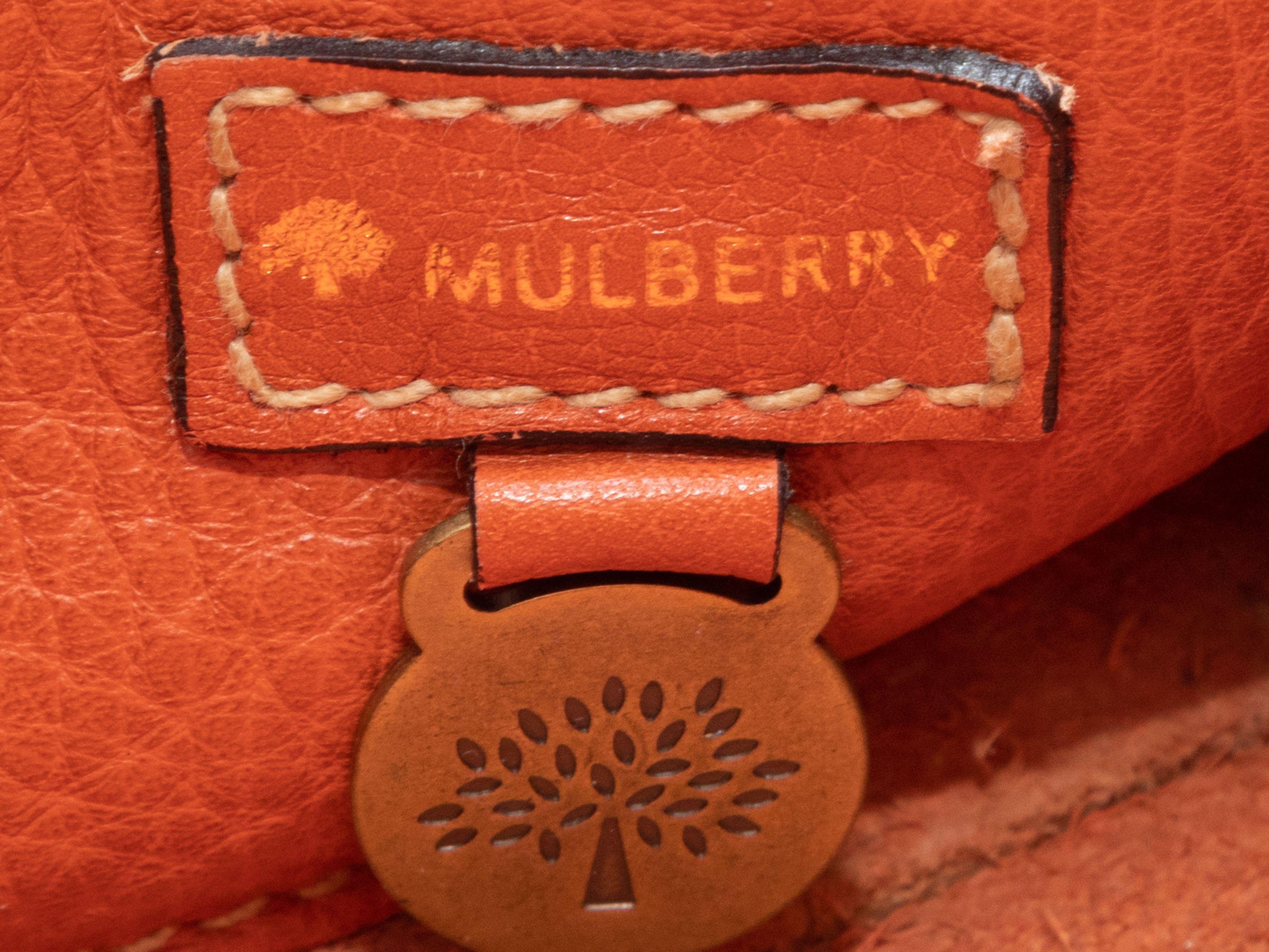 Product Details: Orange Mulberry Bayswater Leather Handbag. The Bayswater Handbag features a leather body, brown leather trim, gold-tone hardware, dual rolled shoulder straps, and a front flap turn-lock closure. 14.5