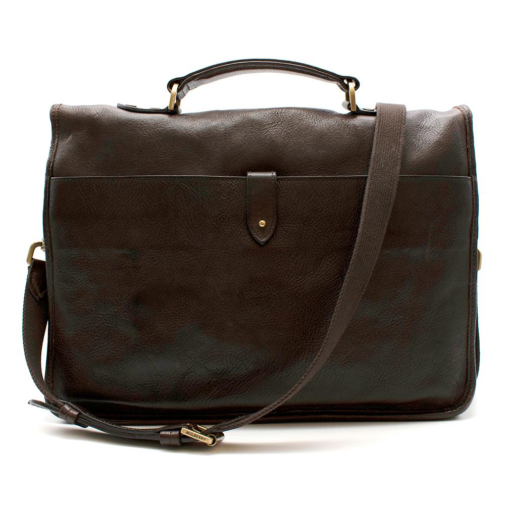 Mulberry Oxblood Chiltern Strapped Briefcase

- Soft oxblood brown leather
- Double buckle fastening 
- Top handle or shoulder strap carry
- Gold hardware strap fastenings and handles 

Materials 
- 100% Leather 

Height - 29cm
Width - 37cm
Depth 9cm
