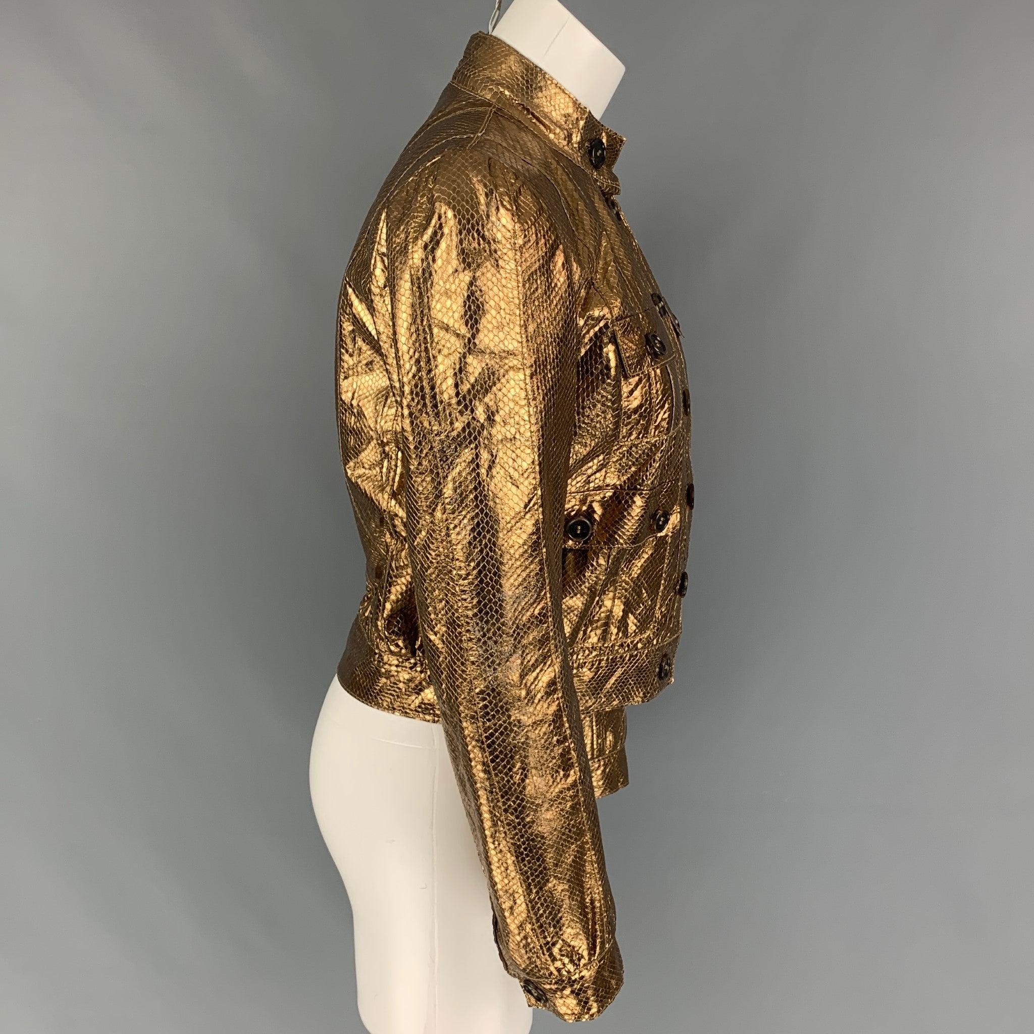 MULBERRY jacket comes in a gold metallic snake skin leather featuring a cropped style, patch pockets, and a buttoned closure.
Very Good
Pre-Owned Condition. 

Marked:   UK 10 / USA 6 / EUR 40 

Measurements: 
 
Shoulder: 15 inches Bust: 38 inches 
