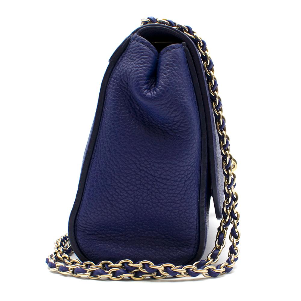 Mulberry Small Size Lily Handbag in Blue 

- Classic Twist Lock 
- Mulberry logo Engraved on Front 
- Gold Tone Hardware 
- Twist Chain Double Strap
- Interior Zip Pocket 
- Classic Grain Leather
- Neon Blue 
- Internal metal Mulberry fob

Includes: