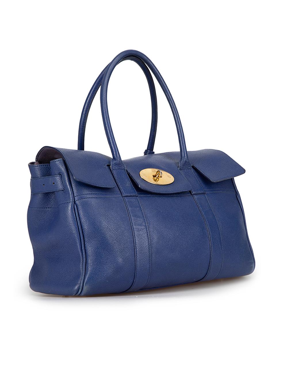 CONDITION is Good. Minor wear to bag is evident. Light wear to front, back handles, tag and lining with scuff marks on this used Mulberry designer resale item. 



Details


Cobalt Blue

Leather

Large tote bag

2x Rolled top handles

Turnlock