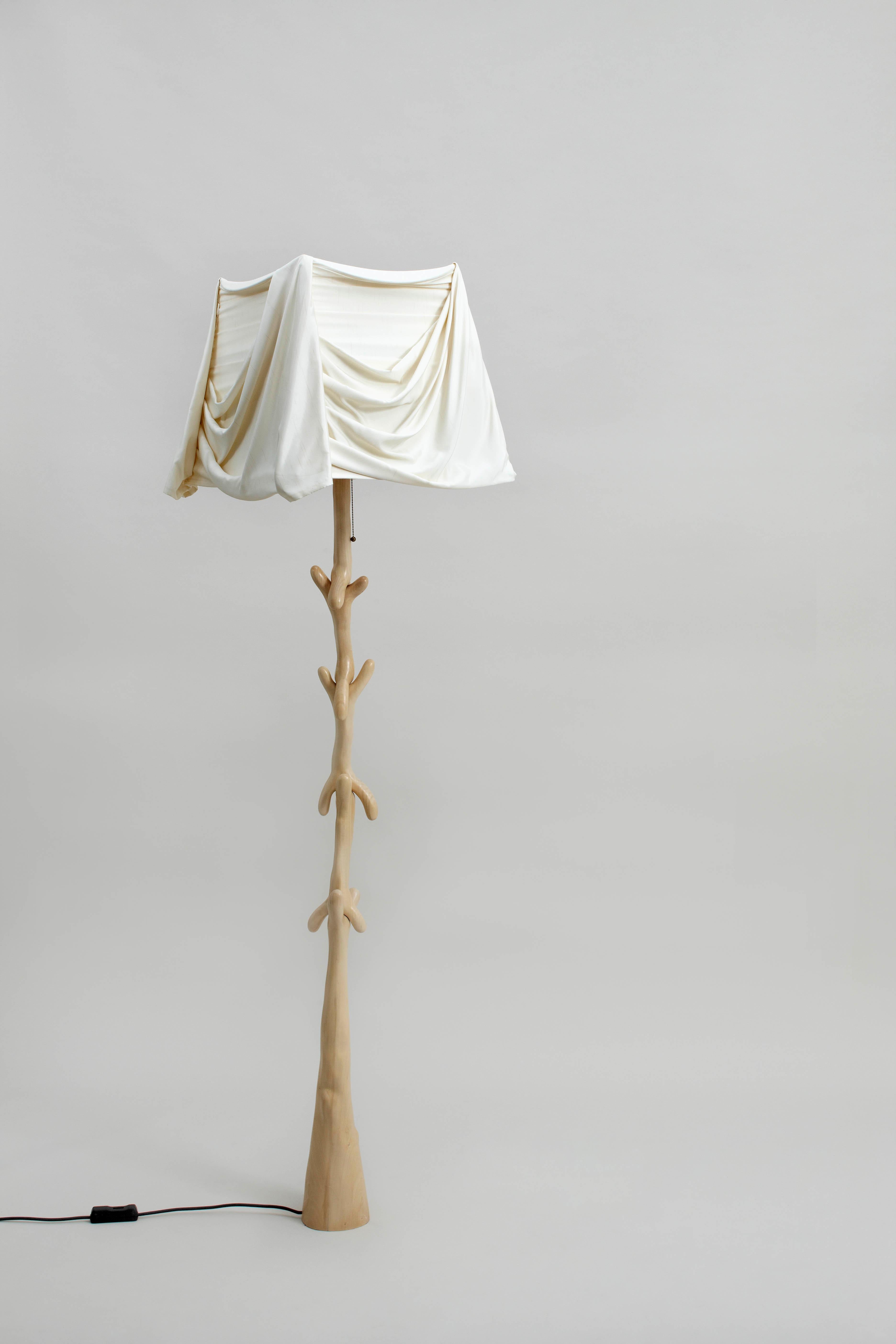 Muletas lamp, Salvador Dalí 
Dimensions: 45 x 45 x 187 H cm
Materials: Carved structure in pale varnished lime-wood.
 Lamp shade in beige linen.


 BDB.
 