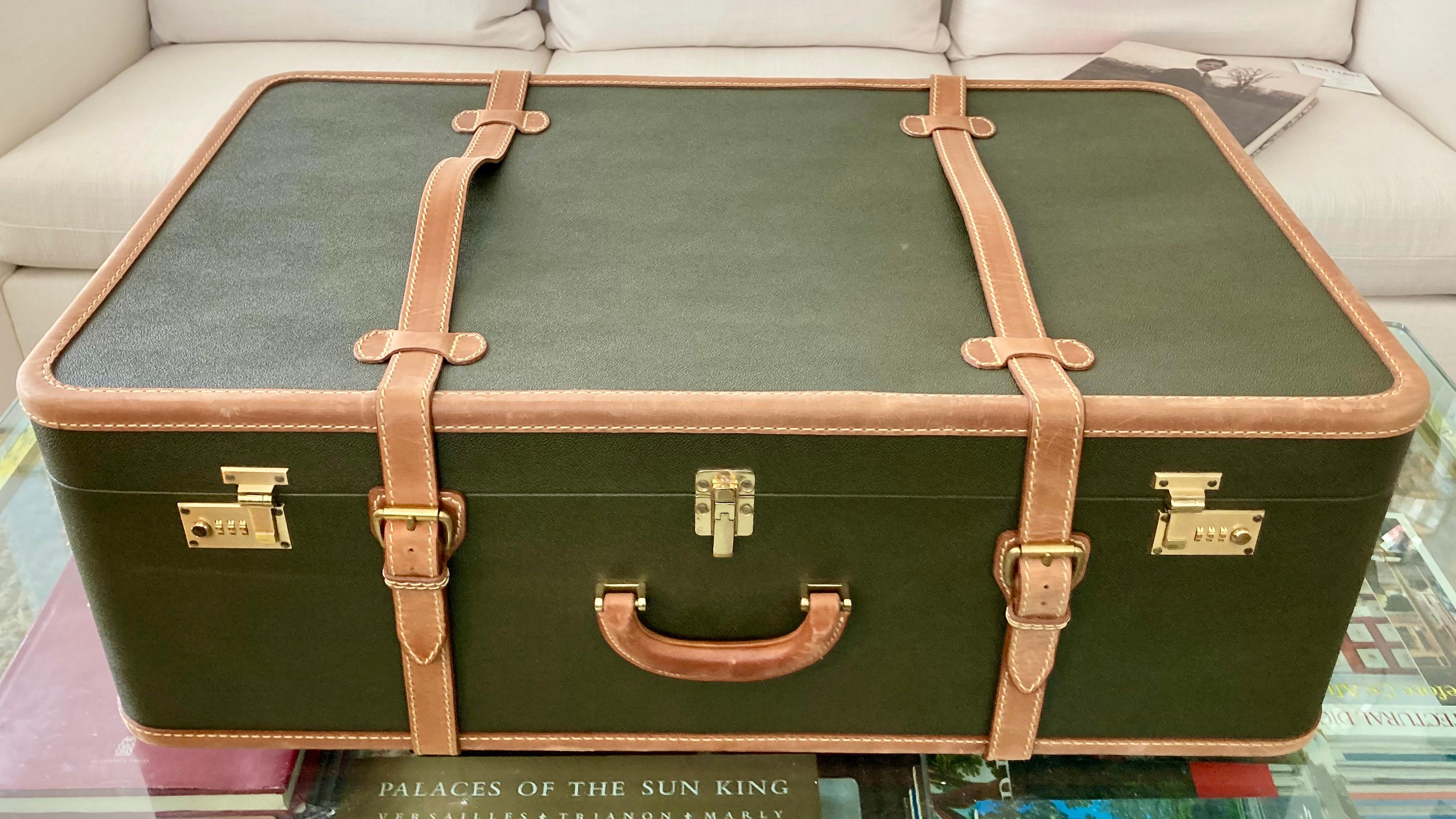 Beautiful Mulholland Brothers travel trunk with casters. Does not appear to have ever been used. Casters are all perfect and still in original bag! An amazing trunk and should be used as a travel trunk. Travel in style!