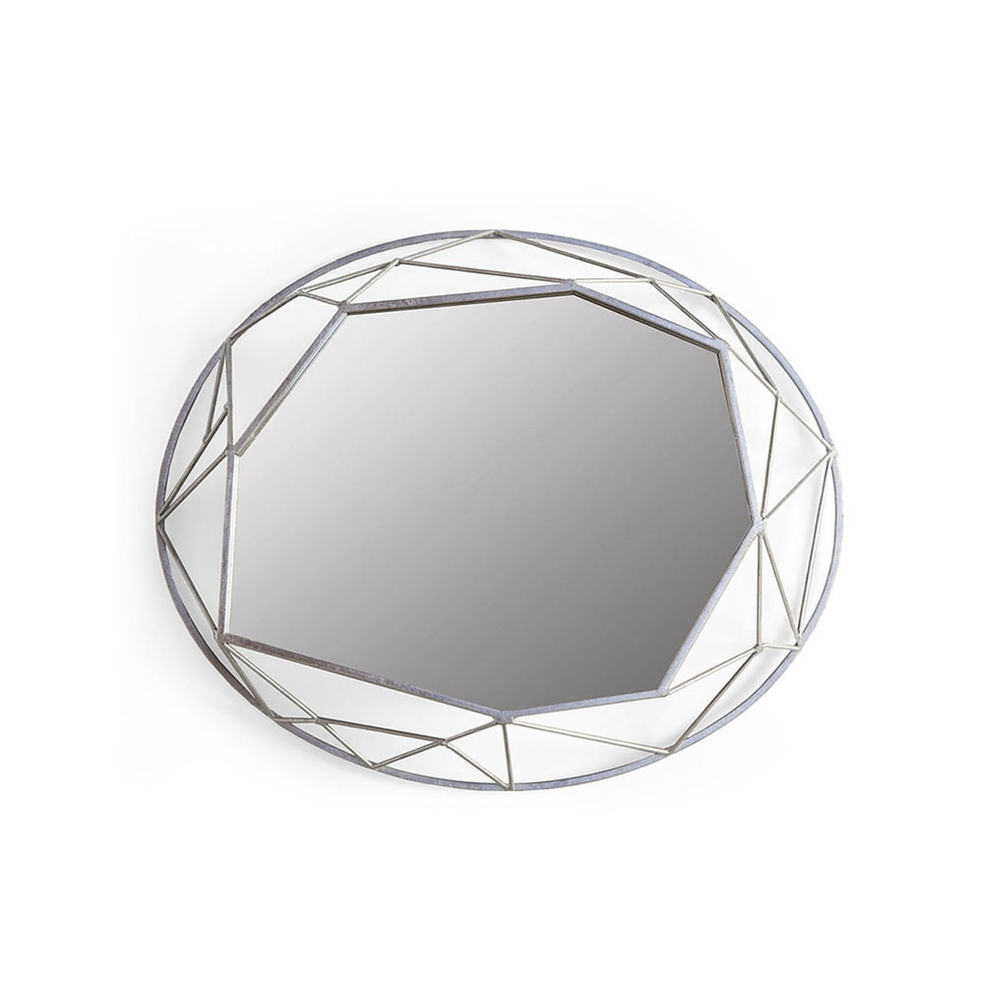 This geometric set of hand-gilded metal mirrors is a modern Minimalist take on the traditional mirror. The stunning Mulholland mirror set works well in a variety of stylistic settings and looks best when blended together amongst all three