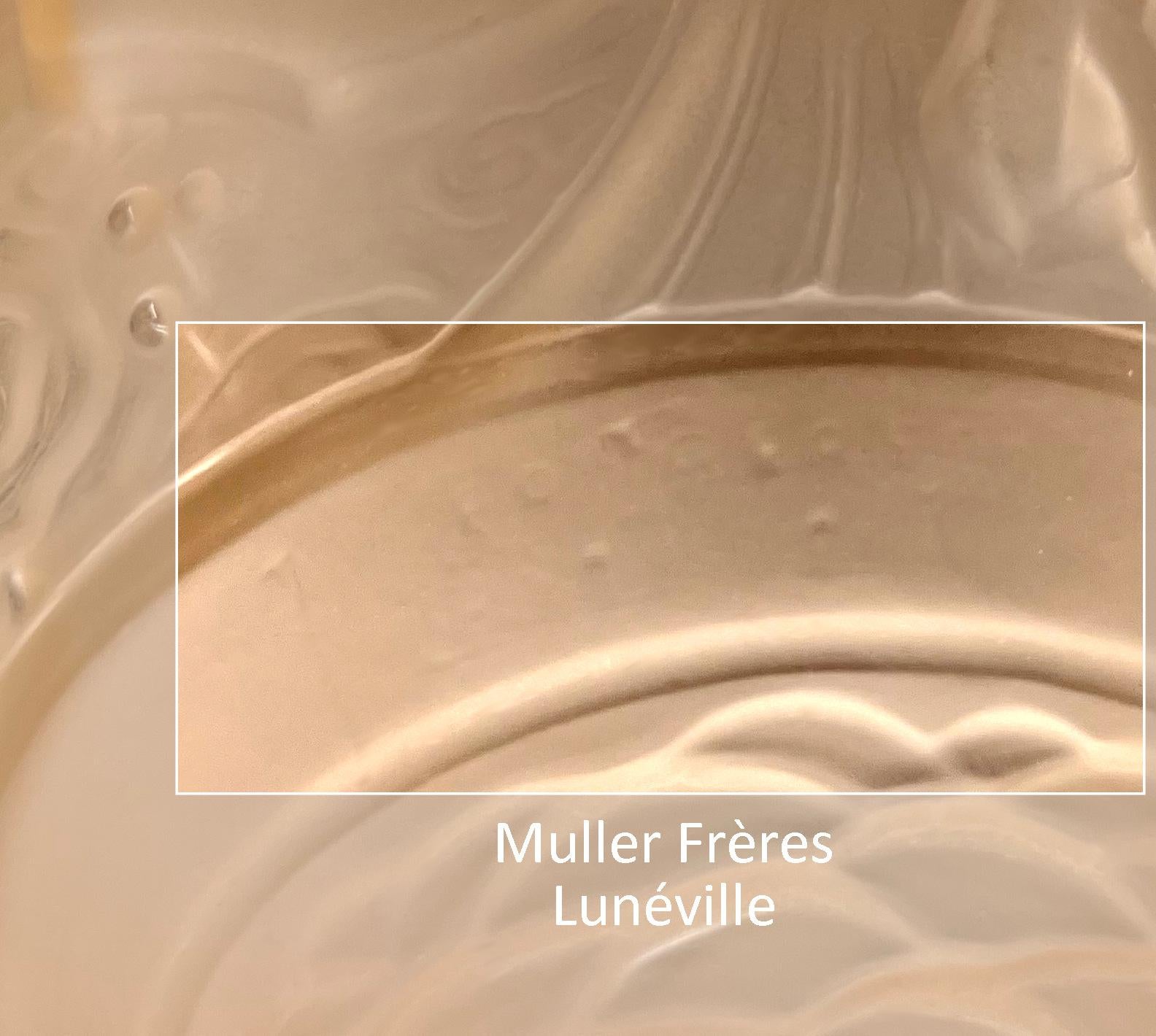 French Art Deco ceiling-light by MULLER FRERES (Luneville), France, ca.1925. Glass and bronze. Thick and large frosted pink glass shade with its gorgeous silver plated fixture. Lit from pink to apricot depending on the LED you use. 6 paradise birds