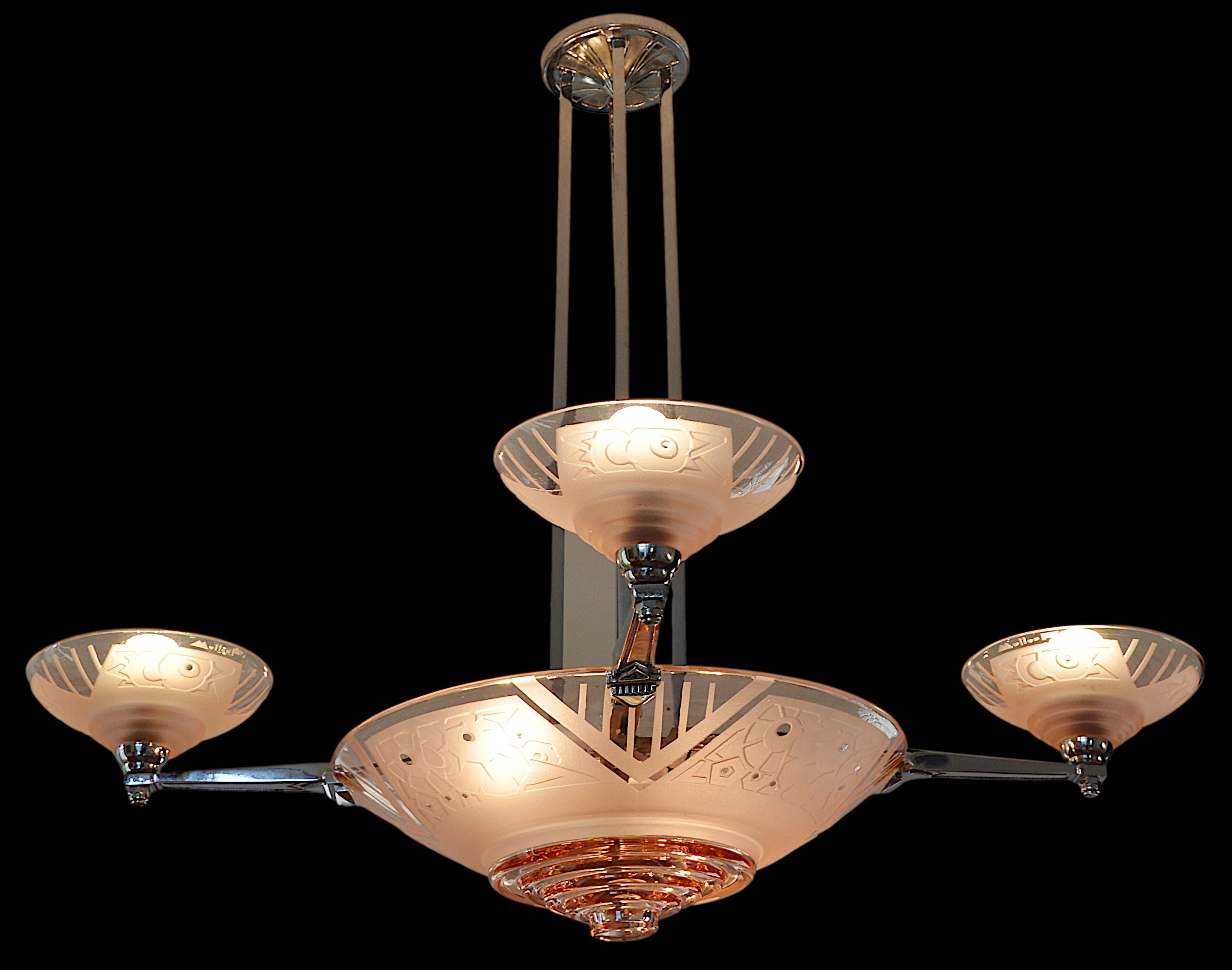 French Art Deco chandelier by MULLER FRERES (Luneville), France, early 1930s. Stylized acid-etched flower pattern on the shades. Nickel-plated bronze. Height : 28.7