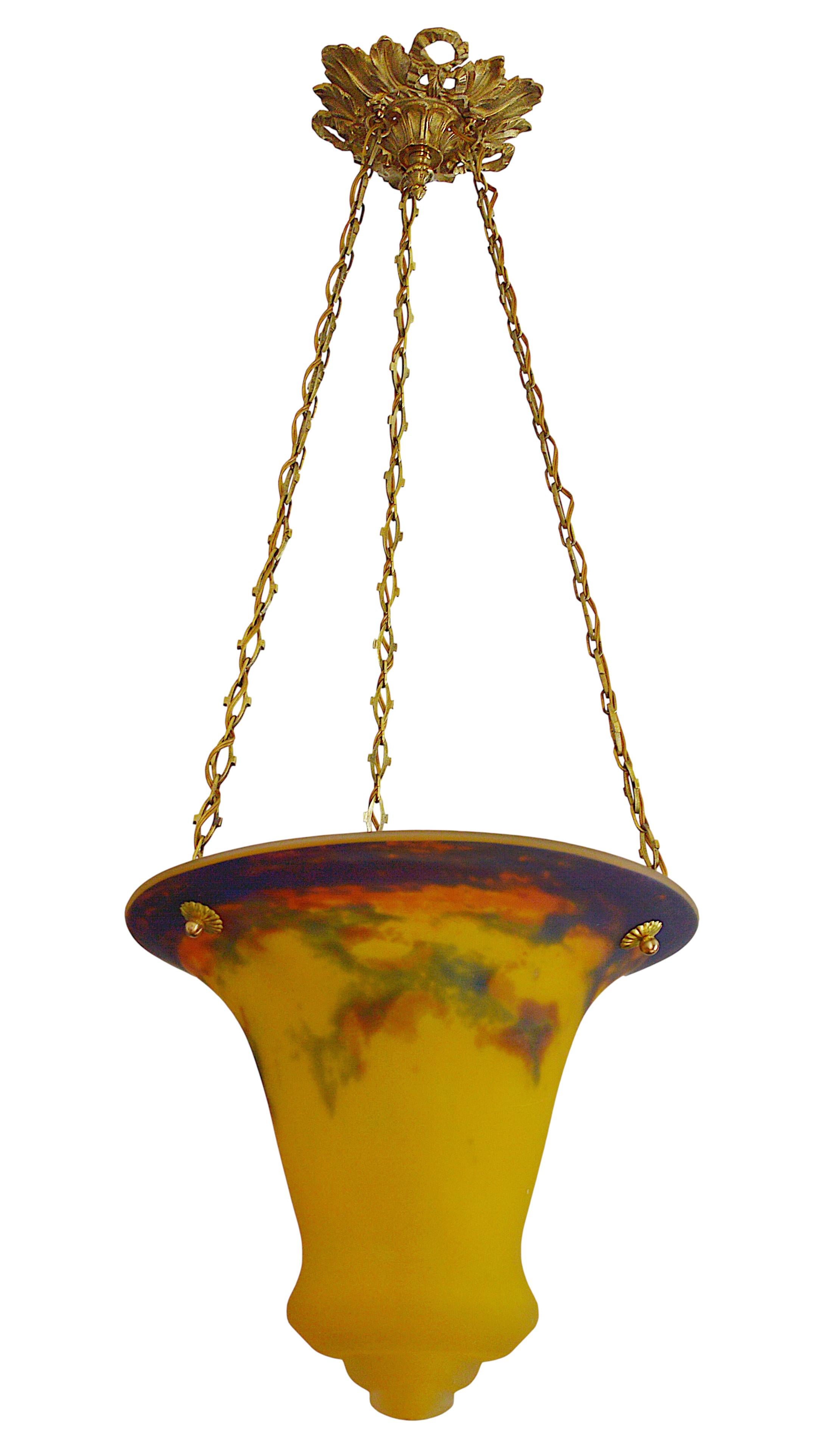 French Art Deco pendant by Muller Freres, Luneville, France, 1920s. Mottled glass shade, rare shape, powders are applied between two layers, that comes hung at its solid bronze fixture. Measures: Height 30