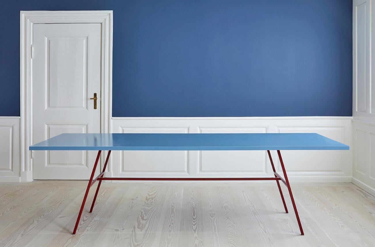 Muller Van Severen long table with lacquered steel table-legs and polyethylene top in blue. 

Manufactured in 2013 by the artist duo Fien Muller and Hannes van Severen.