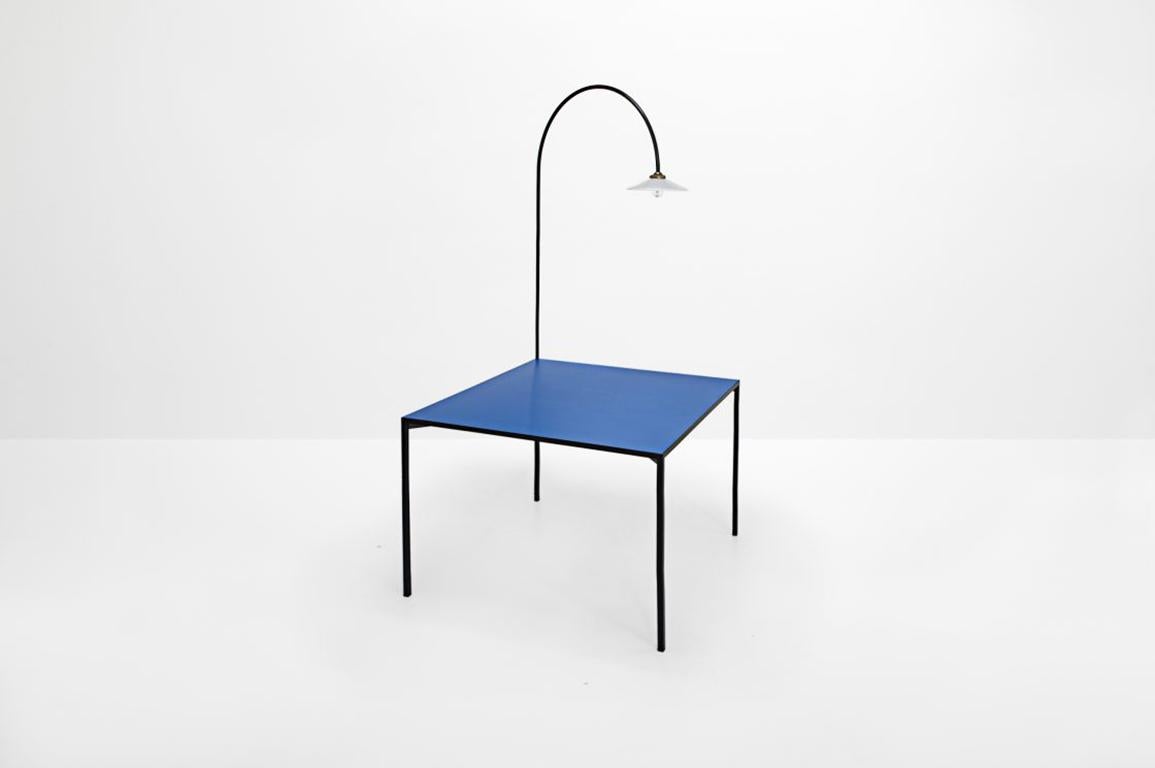 Table and lamp
Manufactured by Muller Van Severen
Belgium, 2015
Black lacquered steel frame and blue polyethylene top
Open edition

Measurements
100 cm x 100cm x 75 H cm, 202 H cm with lamp
39.37 in x 39.37 in x 29.5 H in, 79.5 H in with