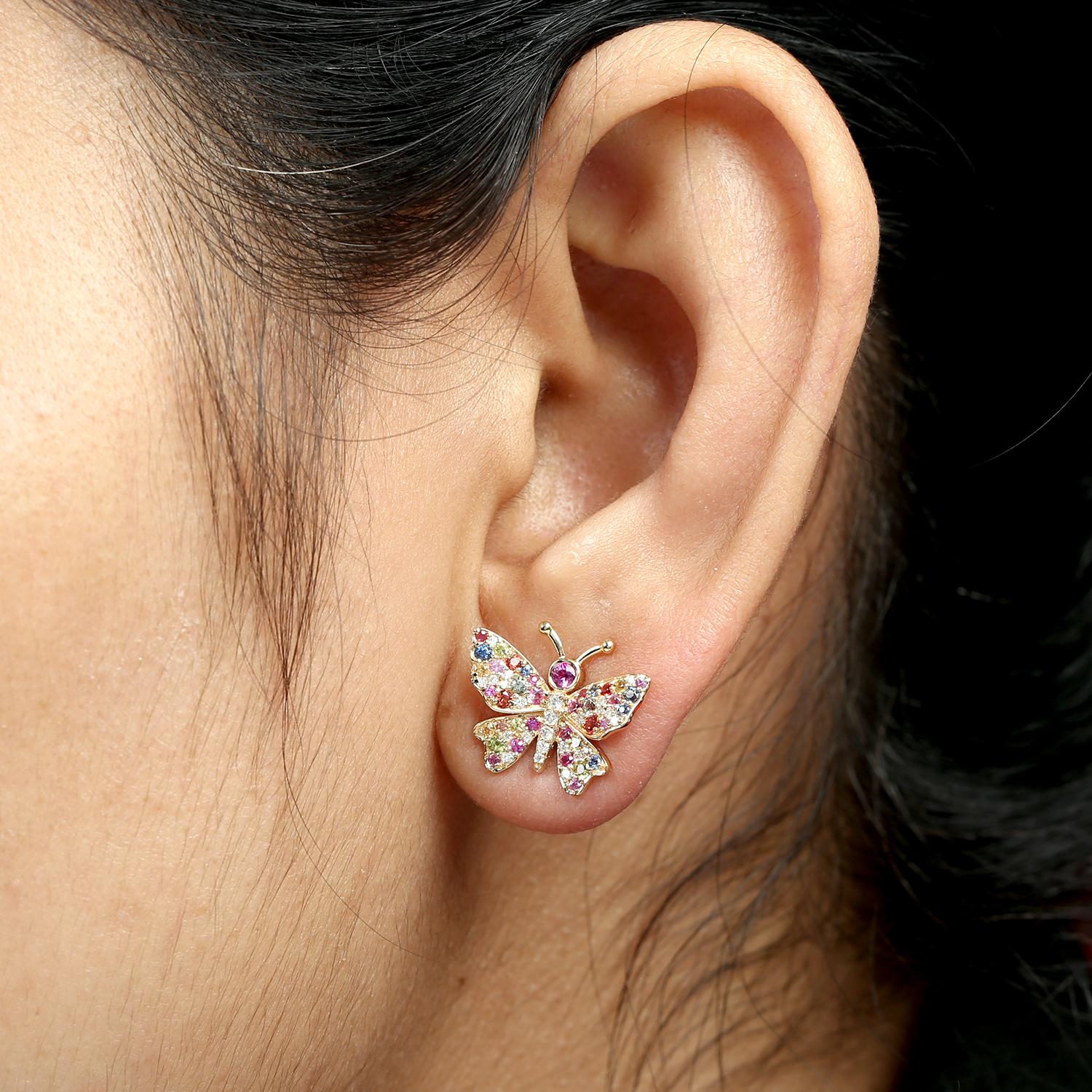 These charming butterfly studs feature a mix of sapphires in vibrant hues, delicately accented with sparkling diamonds. Crafted in rich 18k yellow gold, they bring a playful yet luxurious touch to everyday elegance.

Metal Details:
18KT Yellow Gold