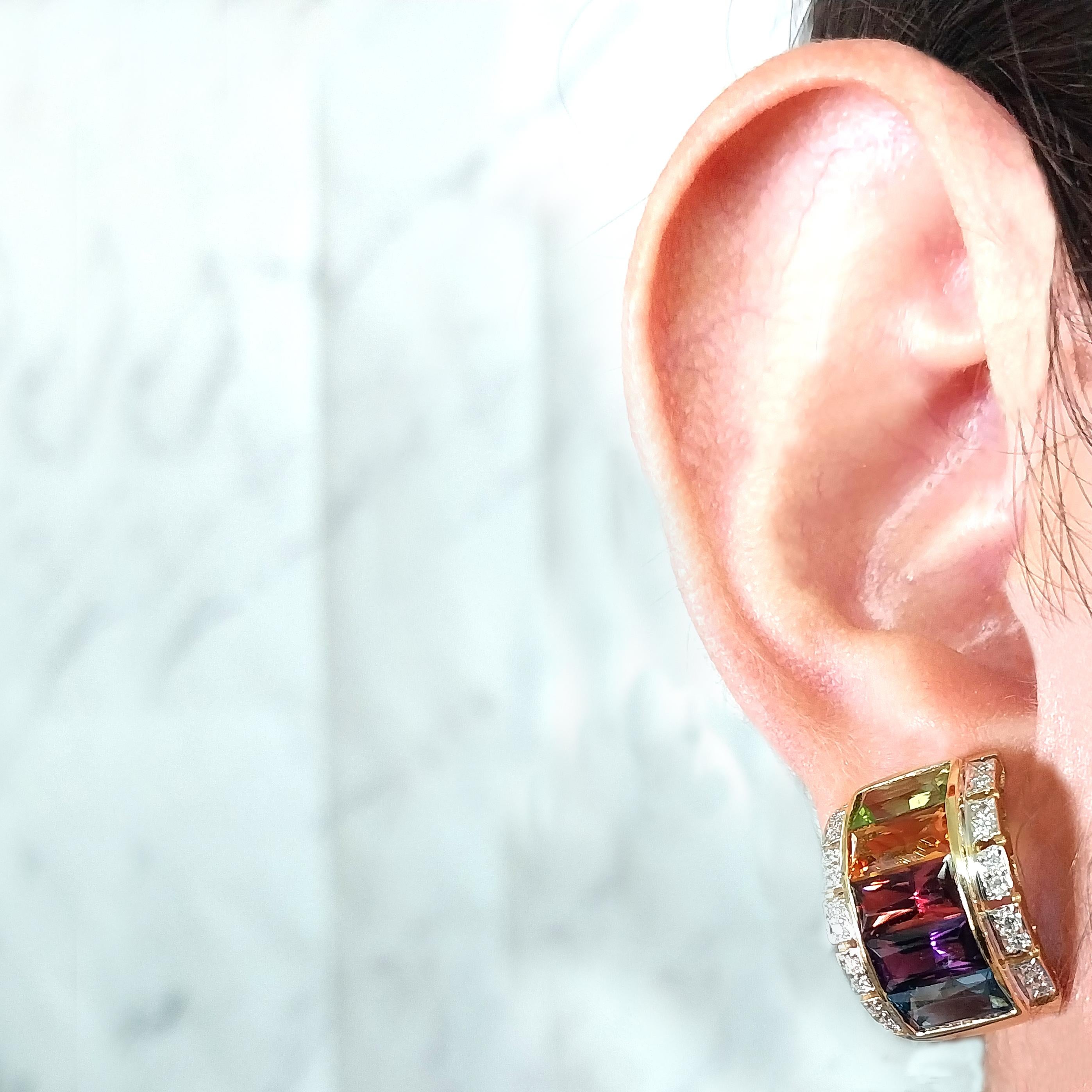 18 Karat Yellow Gold 13.5mm Wide Curved Multicolor Gemstone Earrings Featuring Amethyst, Citrine, Blue Topaz & Garnet Accented by 40 Round Brilliant Cut Diamonds of VS Clarity and G/H Color Totaling Approximately 0.20 Carats. Omega Clip Back with
