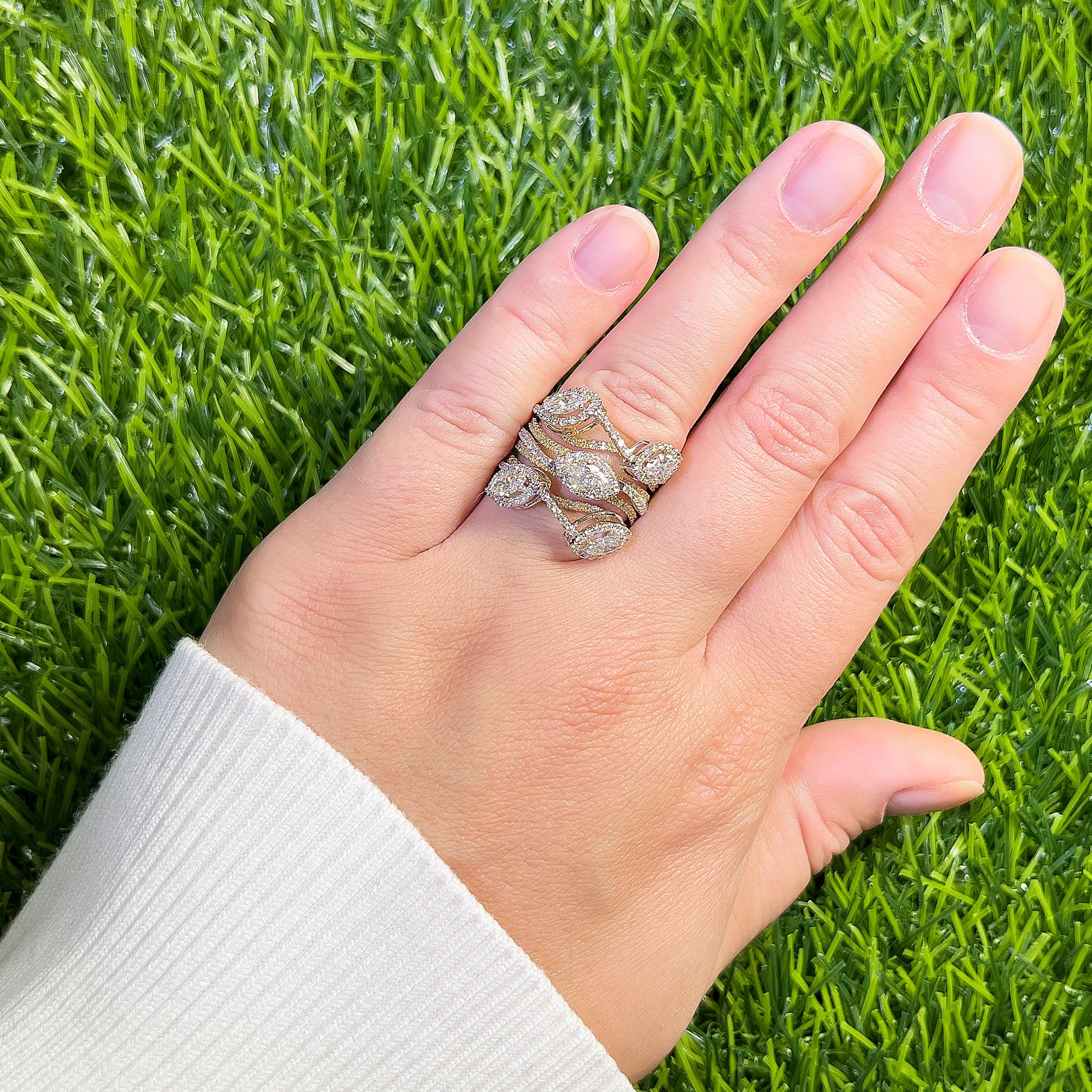 It comes with the appraisal by GIA GG/AJP
5 Marquise Diamonds = 1.02 Carats
220 Round Diamonds = 1.13 Carats
All Diamonds are Natural
Metal: 18K White and Yellow Gold
Ring Size: 6.5* US
*It can be resized complimentary