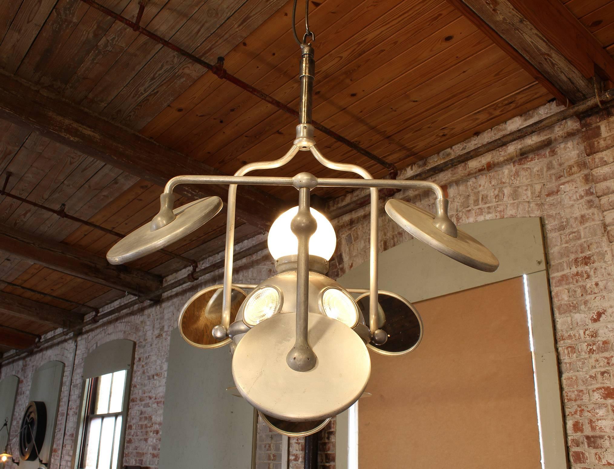 Authentic vintage industrial multi-beam surgical pendant light made by Operay. Measures: 34
