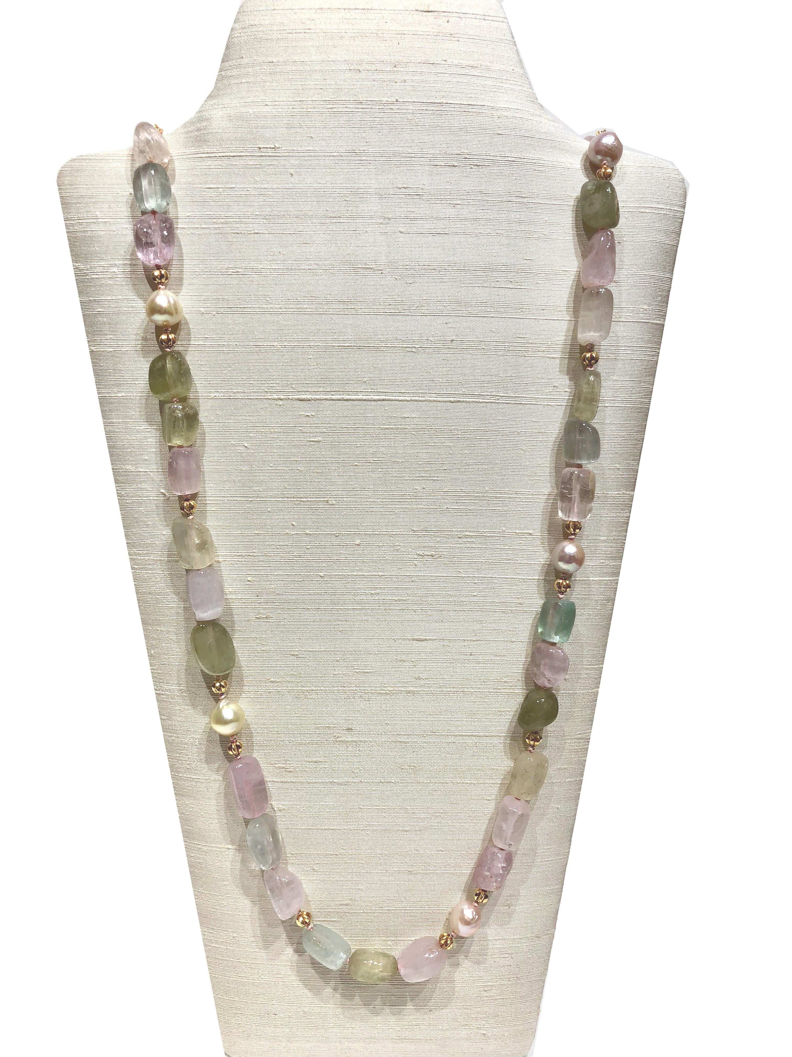 38 in (96.5cm) long necklace with multi-colour aquamarines, freshwater pearls and 18K gold beads & clasp.

Aquamarines are not only blue! Here a harmonious mix of coloured aquamarines, freshwater pearls, and gold bead accents can be worn long or