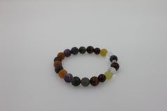Mehrfarbiges Stretchy-Statement-Armband aus Erdstein mit runden Chakra-Perlen