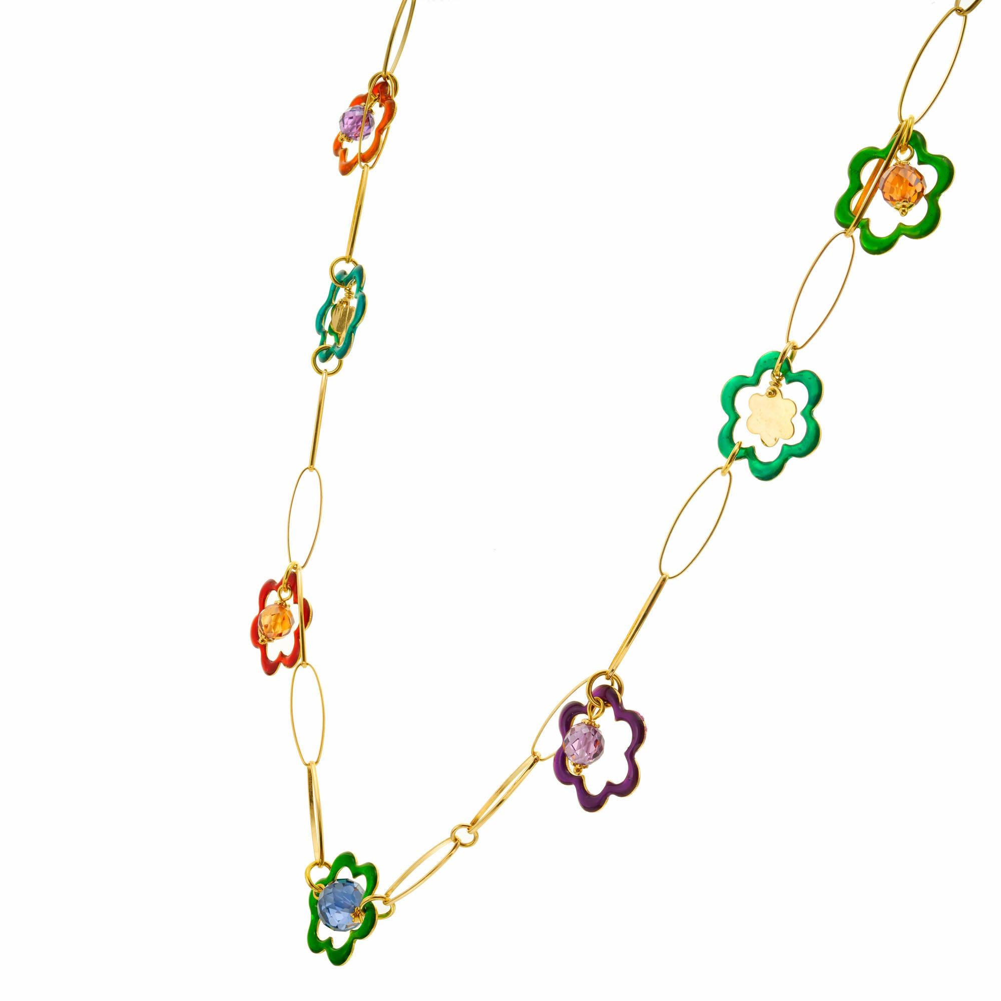 Purple, green and red enamel 18k gold paper clip link necklace. 20 inches in length. 8 enamel colored frames with 6 faceted colored beads. 

6 faceted colored beads, 5.7 -8.0mm
8 enamel colored frames 
18k yellow gold 
19.1 grams
Top to bottom:
