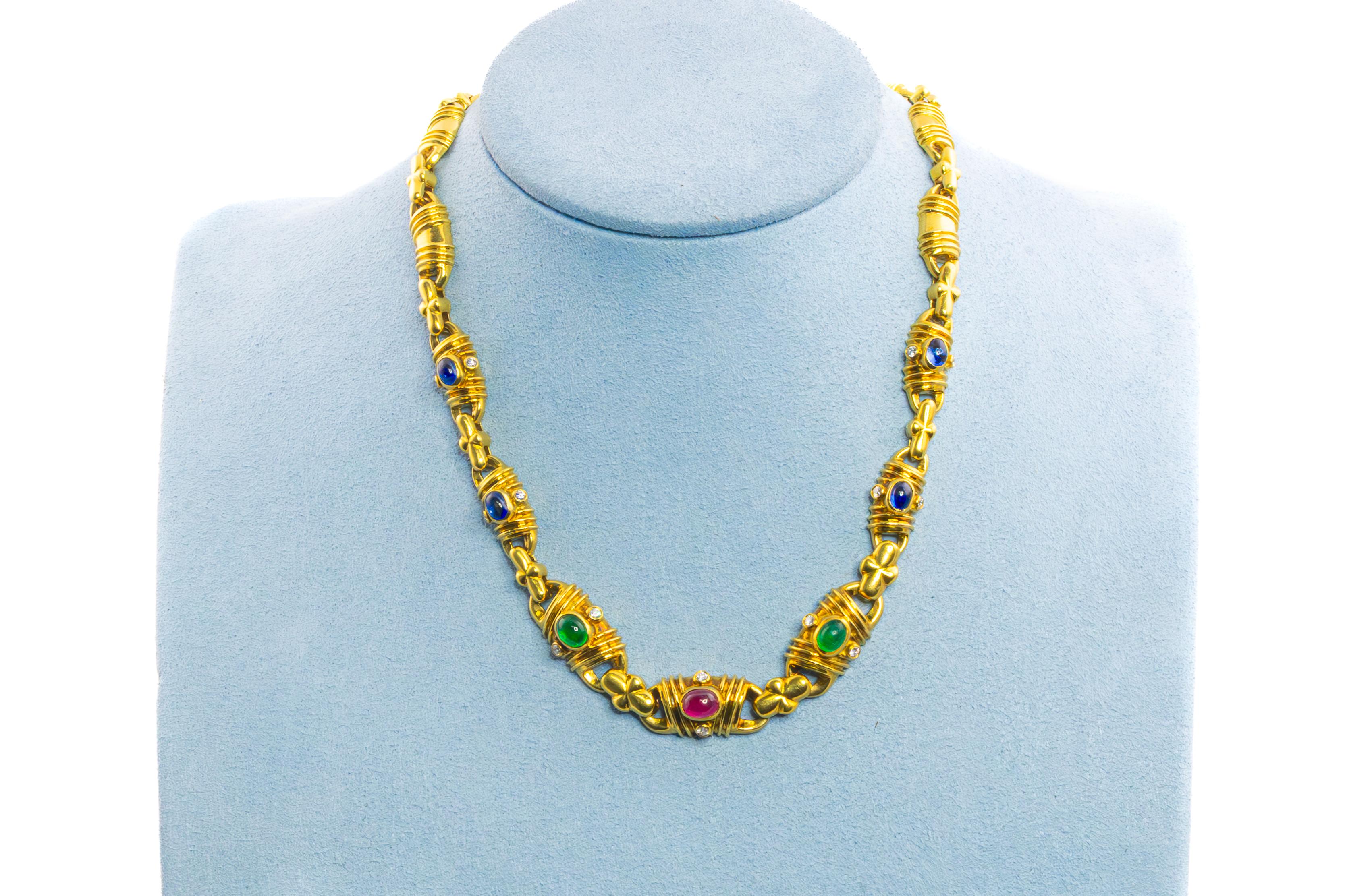 Multi Color Gem Gold Necklace

This luxurious 18K Yellow Gold Necklace is adorned with a stunning selection of fine gemstones, including four cabochon sapphires, two cabochon emeralds, and one cabochon ruby, beautifully complemented by approximately