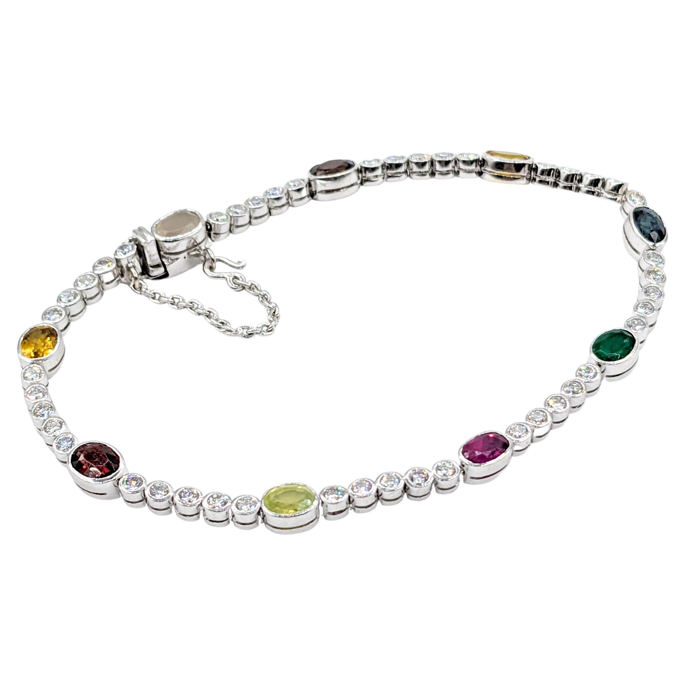 Multi Color Gemstone - Sapphire, Ruby, Moonstone, Quartz, Emerald Bracelet

Discover the epitome of elegance with this stunning bracelet, meticulously crafted from 18kw white gold. Encrusted with 1.35ctw of round diamonds, this piece radiates an