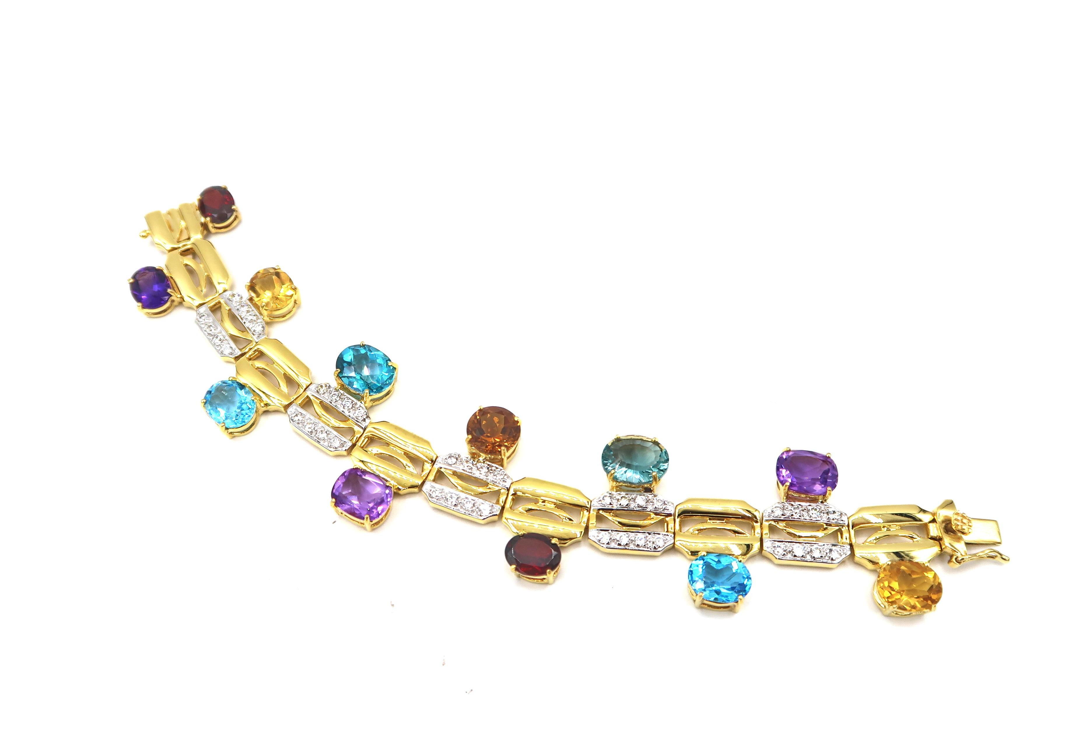 Multicolour Gemstones White Zircon Bracelet

Length : 17 cms long
Width : A little over 1 inch

Gold : 18K Gold 40.92g.
Multicolour Gemstones : Blue Topaz, Garnet, Citrine, Amethyst 33.24cts.
Zircon : 1.60ct.