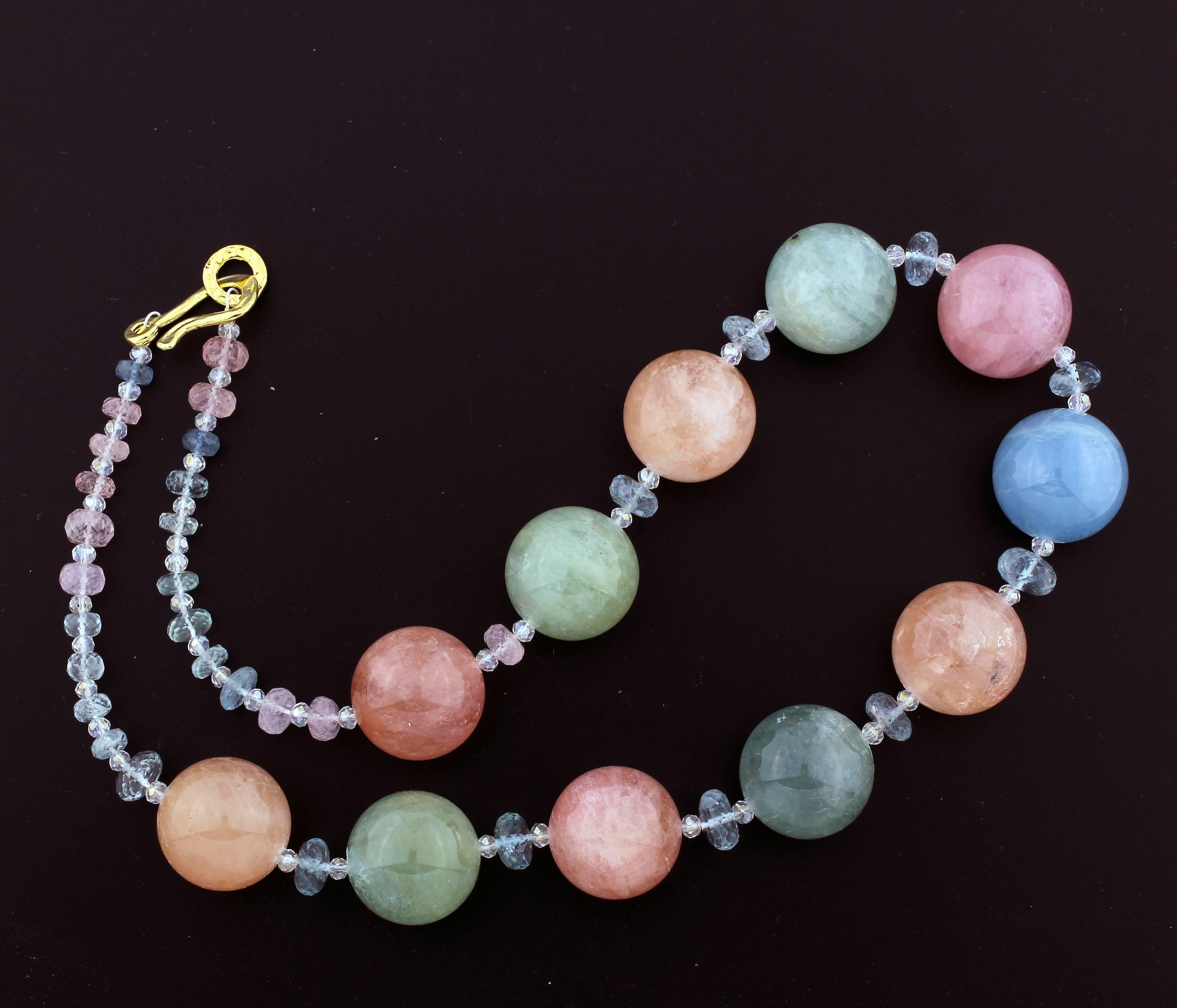 Glowing glistening colors of natural highly polished Aquamarine, Morganite, and Green Beryl hang 20 inches long from a hammered gold plated sterling silver (vermeil) clasp.  This goes gracefully and elegantly from daytime to evening events.