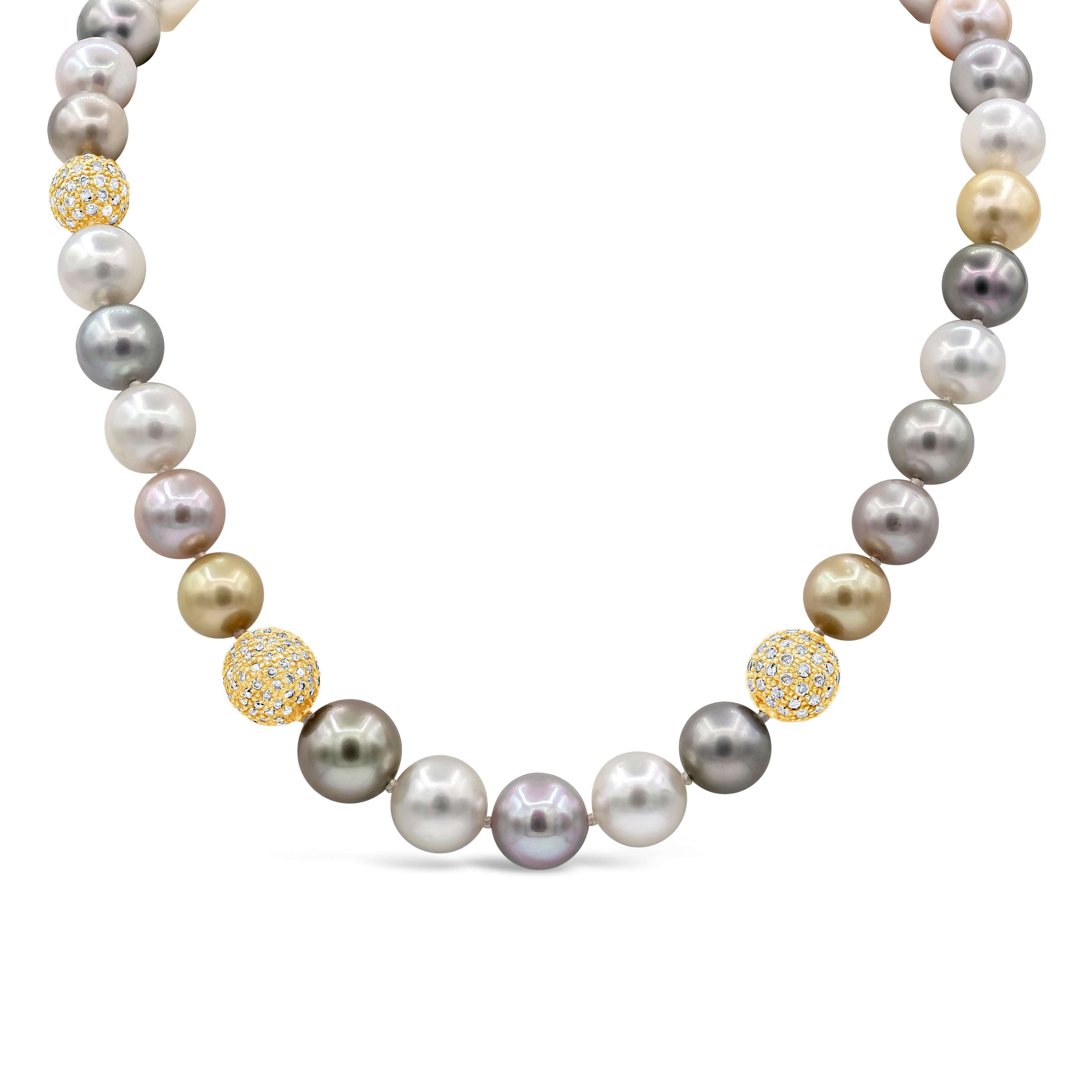 Showcasing a colorful combination of South Sea and freshwater pearls in a single strand necklace. Spaced by four 18 karat yellow gold beads encrusted with diamonds (7.00 carats total). Pearls are approximately 11.20 - 13.60 millimeters.

