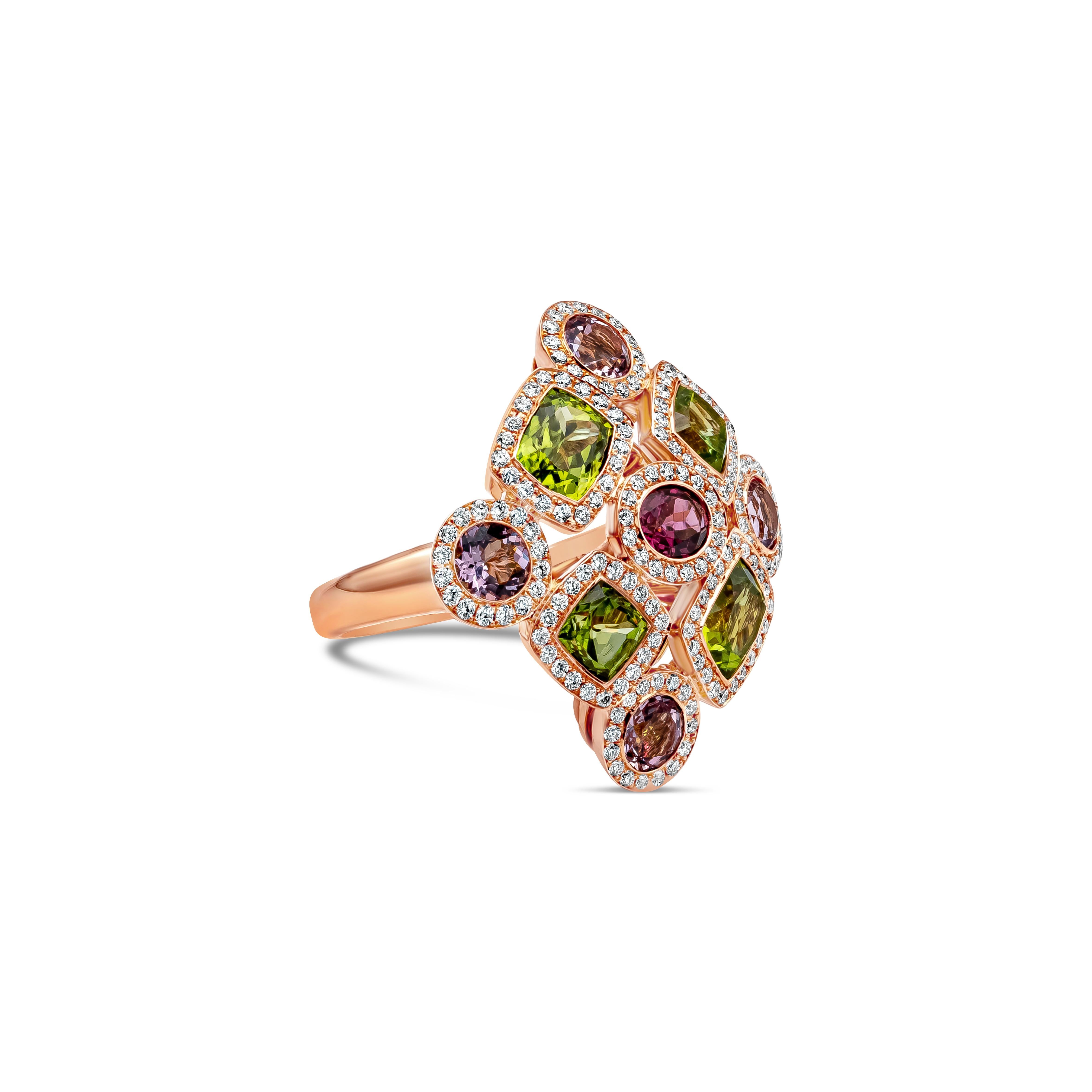 An Art Deco piece of jewelry showcasing 9 color-rich gem stones surrounded by 164 pieces of F color brilliant round diamonds that weighs 0.81 carats total and has VS clarity. On the center is a pink oval cut rubellite weighing 0.55 carats. Four