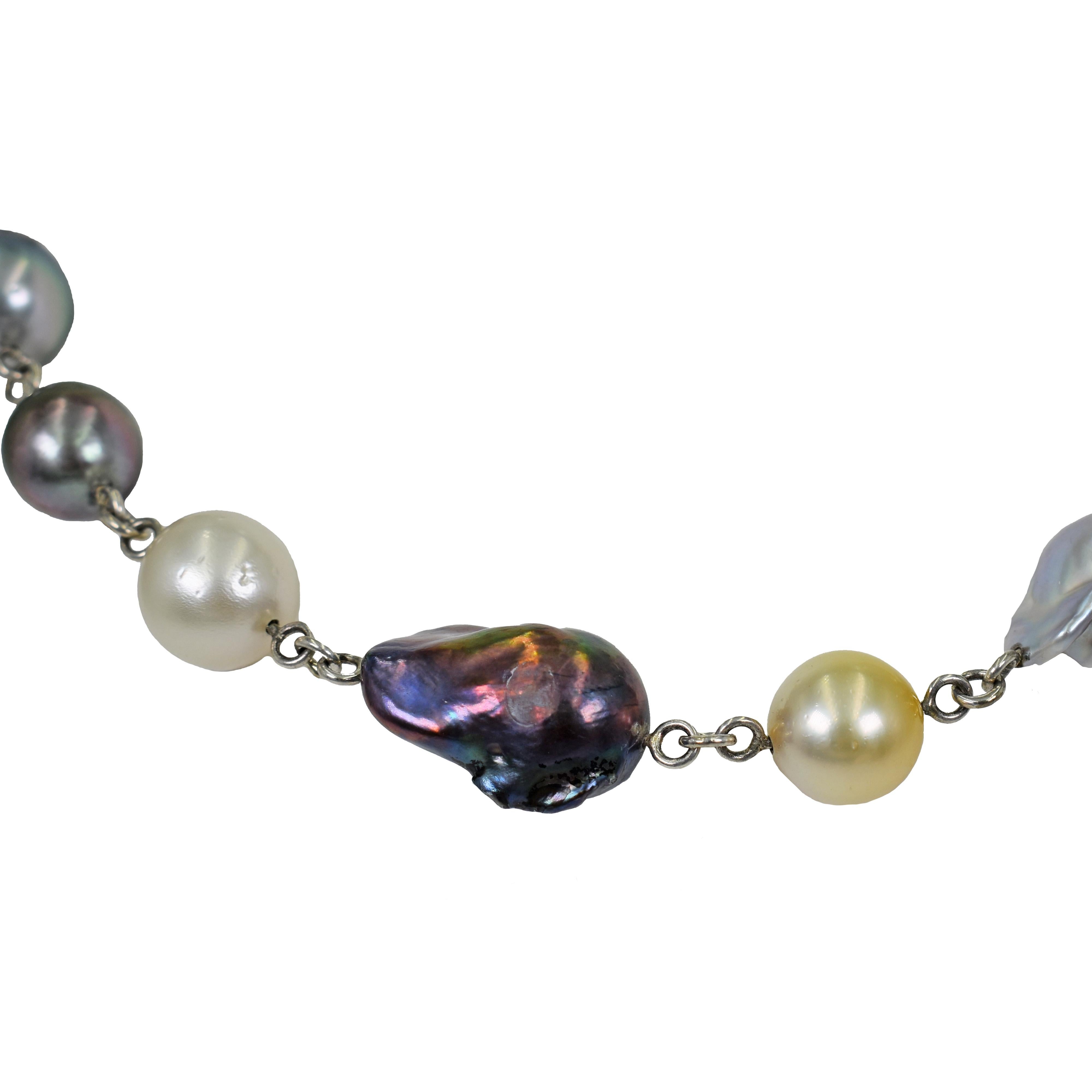 Round and baroque pearl beads in a variety of colors, including Tahitian, White, Pink, Gold, Black and Gray, linked together in a handmade sterling silver collar necklace. Pearls range from 13mm to 30mm in size. Necklace is 18 inches in length. This