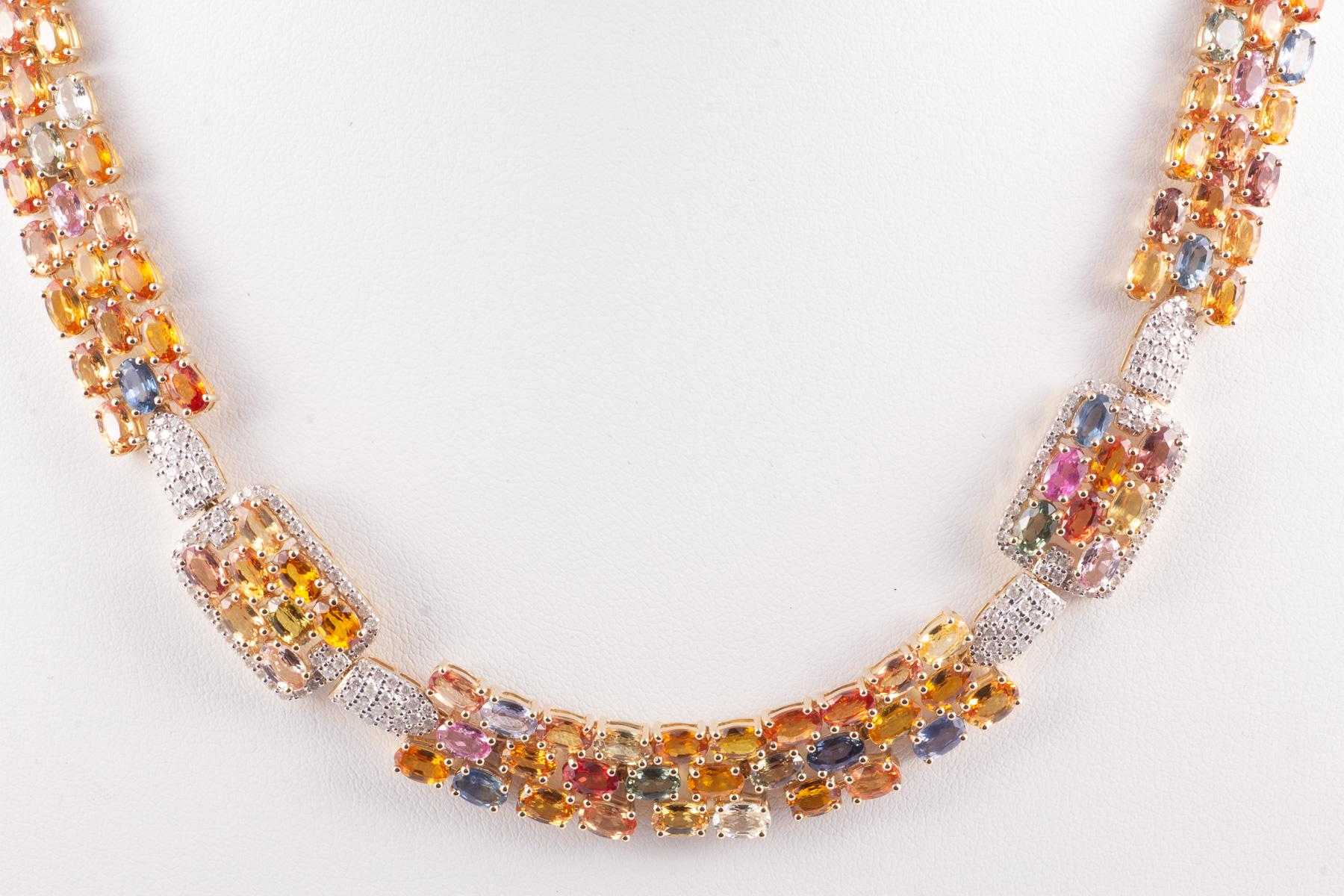 Beautifully colored 14k gold sapphire and diamond necklace having 54.7 carats sapphires and 3.01 carats diamonds