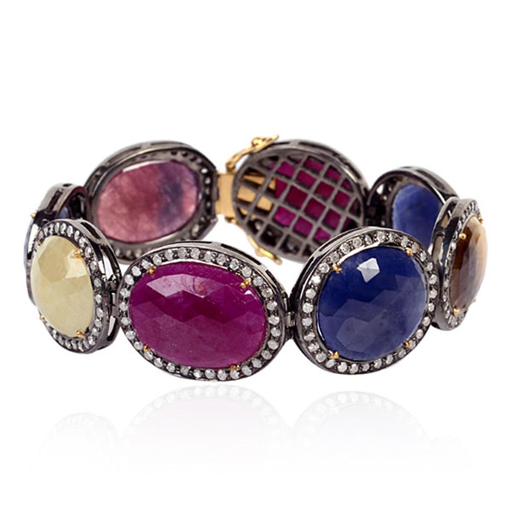 Artisan Multi Color Sapphire and Ruby Tennis Bracelet with Diamonds Set in Gold & Silver For Sale