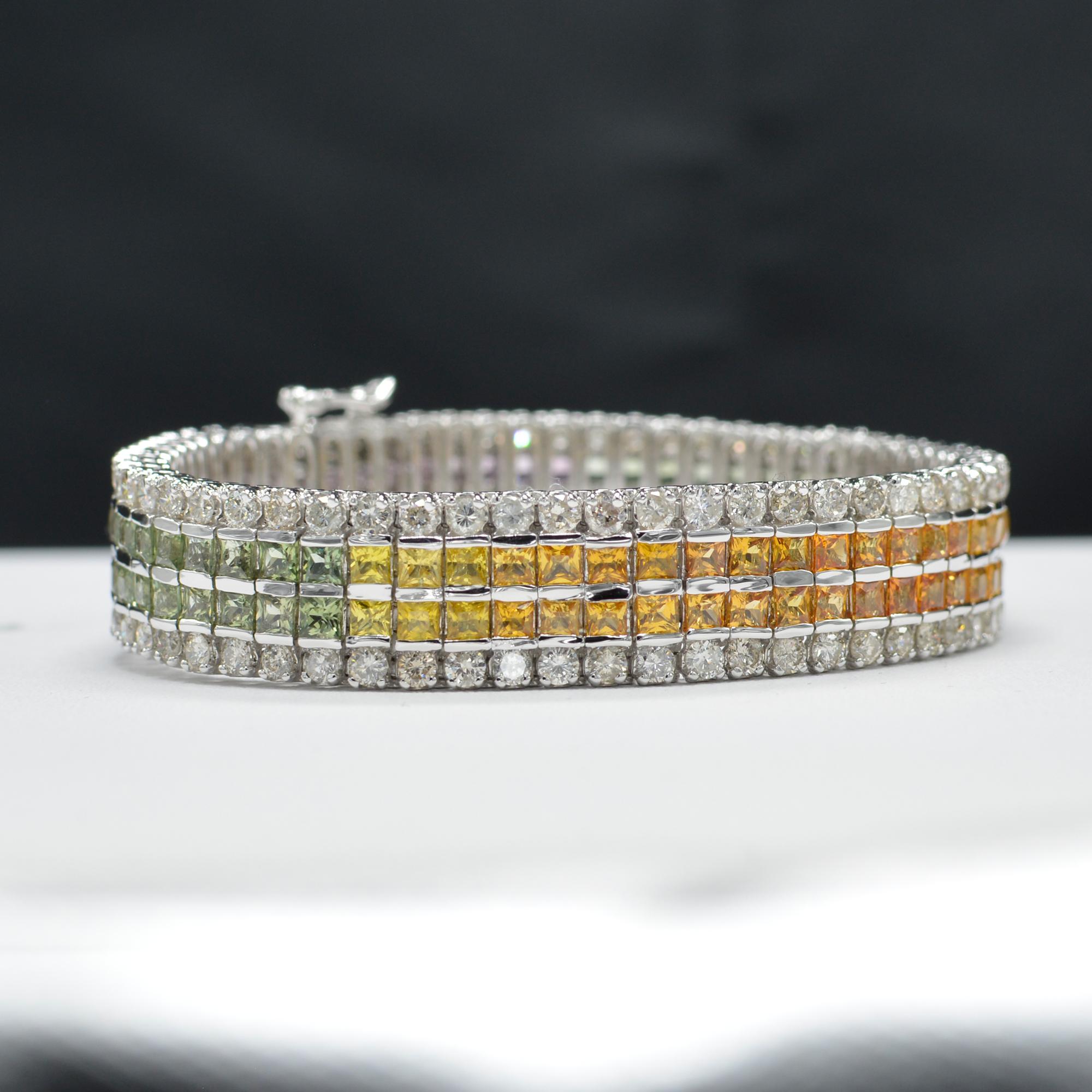 Brilliant Magnificent Look.
Multi Sapphire Bracelet AAA Quality Sapphires Total of 18.00 carat.
with Diamonds on the sides total of 2.00 carat  H I-SI.
14K White Gold 39.0 Grams.
Length 7' Inch.
Bracelet width is approx. 13 mm
