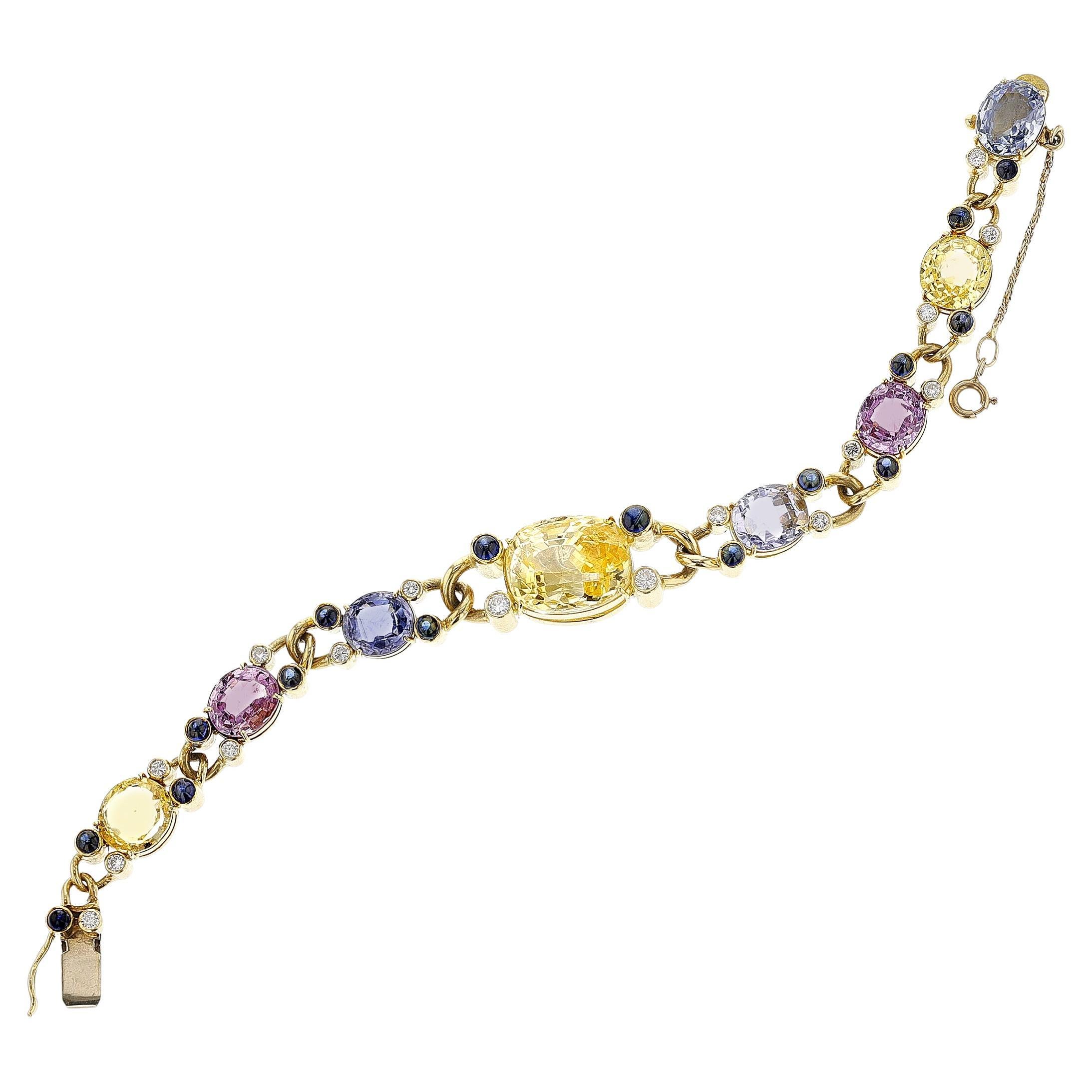 Multi-Color Sapphire Cut Stones and Cabochon with Diamond Bracelet by Deaken & F For Sale