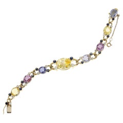 Vintage Multi-Color Sapphire Cut Stones and Cabochon with Diamond Bracelet by Deaken & F